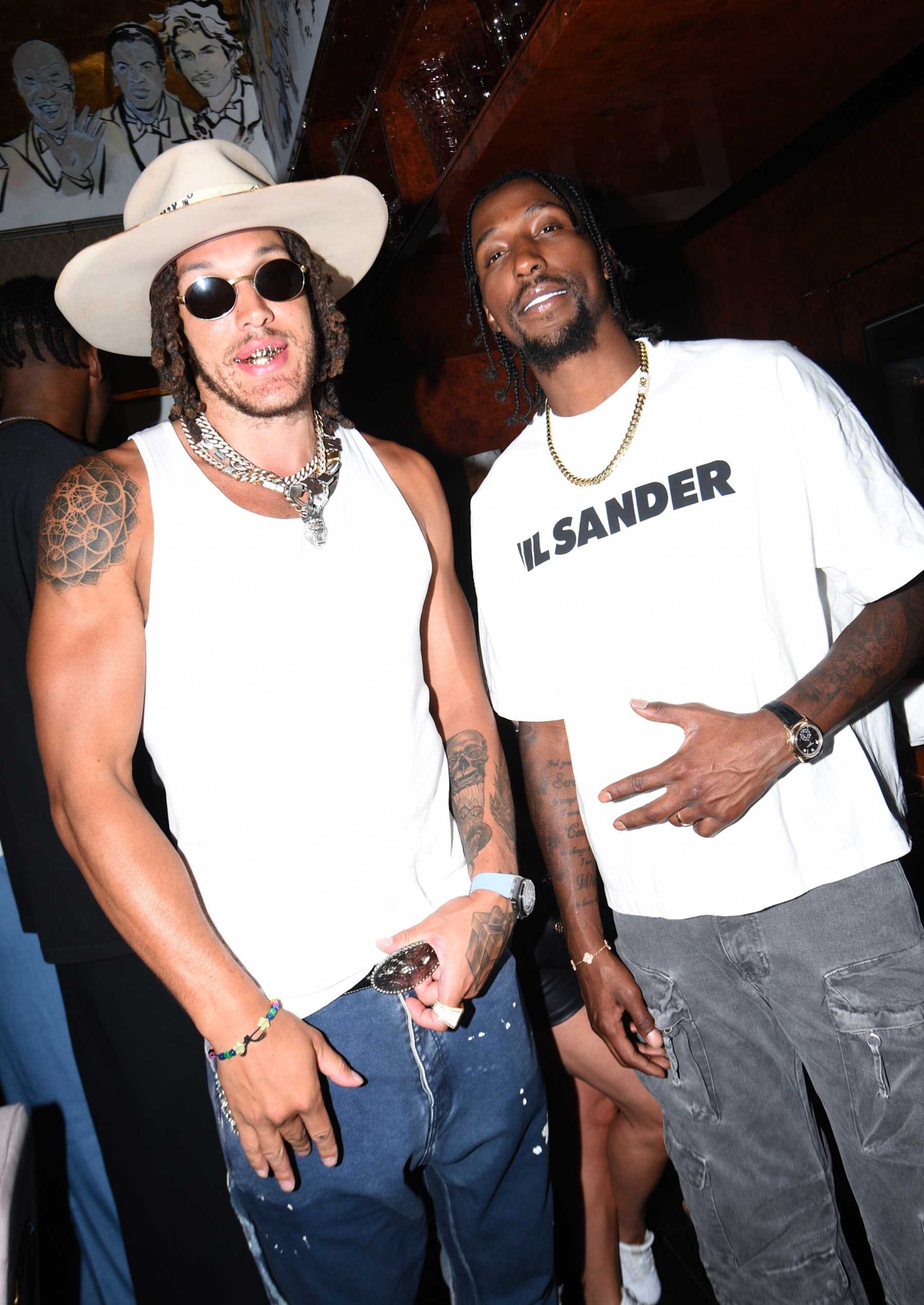 LAS VEGAS, NEVADA - JULY 13: (EXCLUSIVE COVERAGE) Aaron Gordon and Kentavious Caldwell-Pope attend the DraftKings x Delilah Las Vegas Summer League Party at Delilah at the Wynn Las Vegas on July 13, 2024 in Las Vegas, Nevada. (Photo by Vivien Killilea/Getty Images for The h.wood Group )
