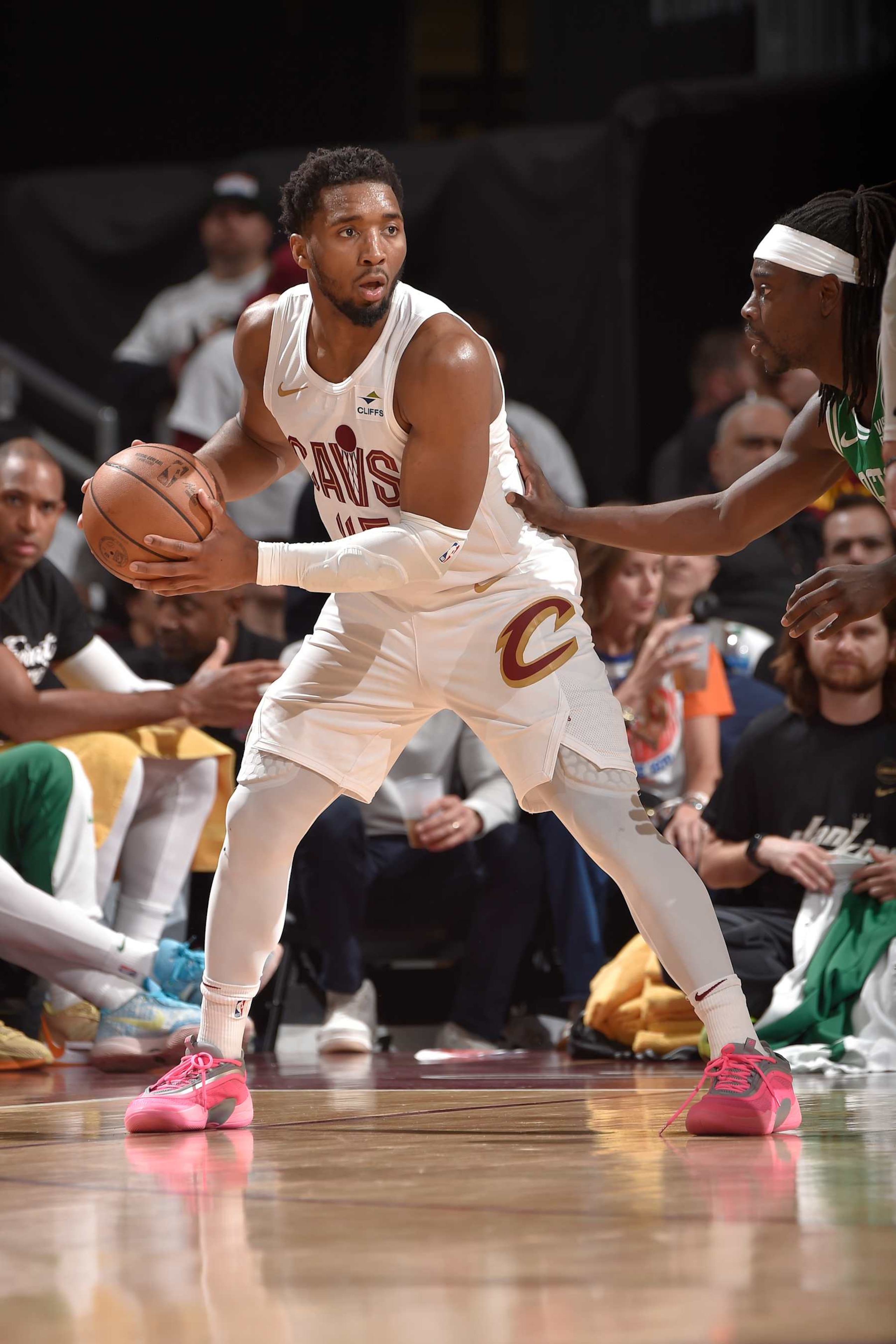 CLEVELAND, OH - MAY 11: Donovan Mitchell #45 of the Cleveland Cavaliers handles the ball during the game  against the Boston Celtics during Round 2 Game 3 of the 2024 NBA Playoffs on May 11, 2024 at Rocket Mortgage FieldHouse in Cleveland, Ohio. NOTE TO USER: User expressly acknowledges and agrees that, by downloading and/or using this Photograph, user is consenting to the terms and conditions of the Getty Images License Agreement. Mandatory Copyright Notice: Copyright 2024 NBAE (Photo by David Liam Kyle/NBAE via Getty Images)