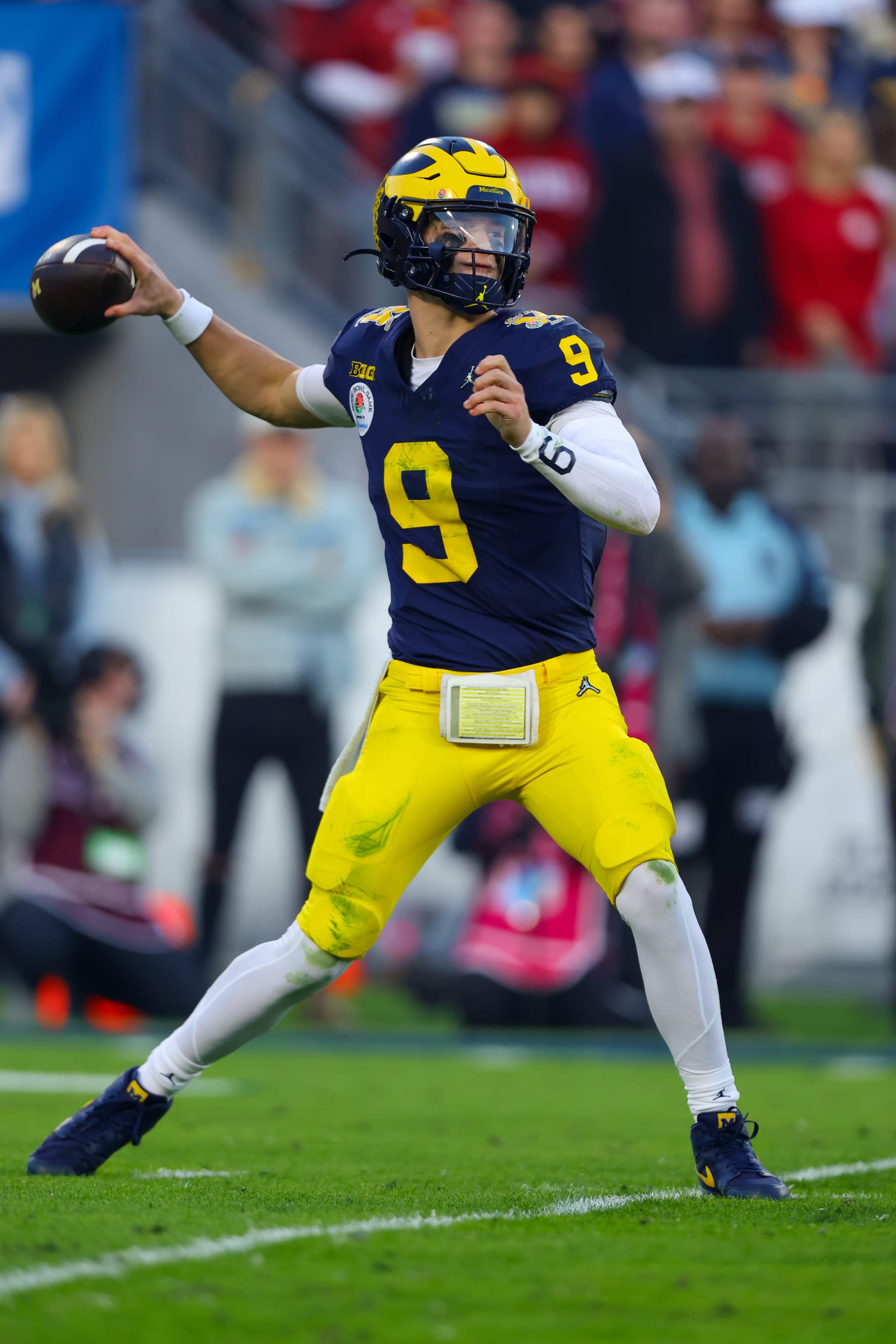 PASADENA, CA - JANUARY 01: Michigan Wolverines quarterback J.J. McCarthy (9) looks to throw the ball during the Alabama Crimson Tide game versus the Michigan Wolverines CFP Semifinal at the Rose Bowl Game on January, 1, 2024, at the Rose Bowl Stadium in Pasadena, CA. (Photo by Jordon Kelly/Icon Sportswire via Getty Images)