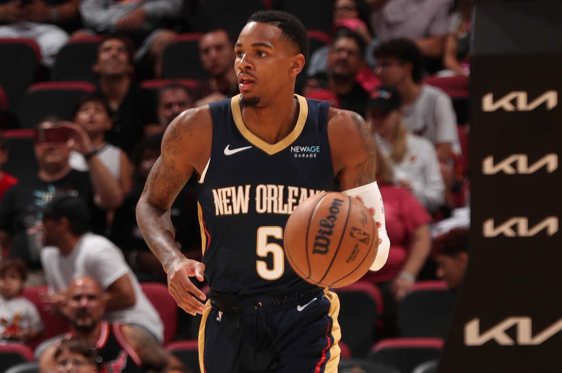 MIAMI, FL - OCTOBER 13: Dejounte Murray #5 of the New Orleans Pelicans dribbles the ball during the game against the Miami Heat during a NBA pre season game on October 13, 2024 at Kaseya Center in Miami, Florida. NOTE TO USER: User expressly acknowledges and agrees that, by downloading and or using this Photograph, user is consenting to the terms and conditions of the Getty Images License Agreement. Mandatory Copyright Notice: Copyright 2024 NBAE (Photo by Issac Baldizon/NBAE via Getty Images)