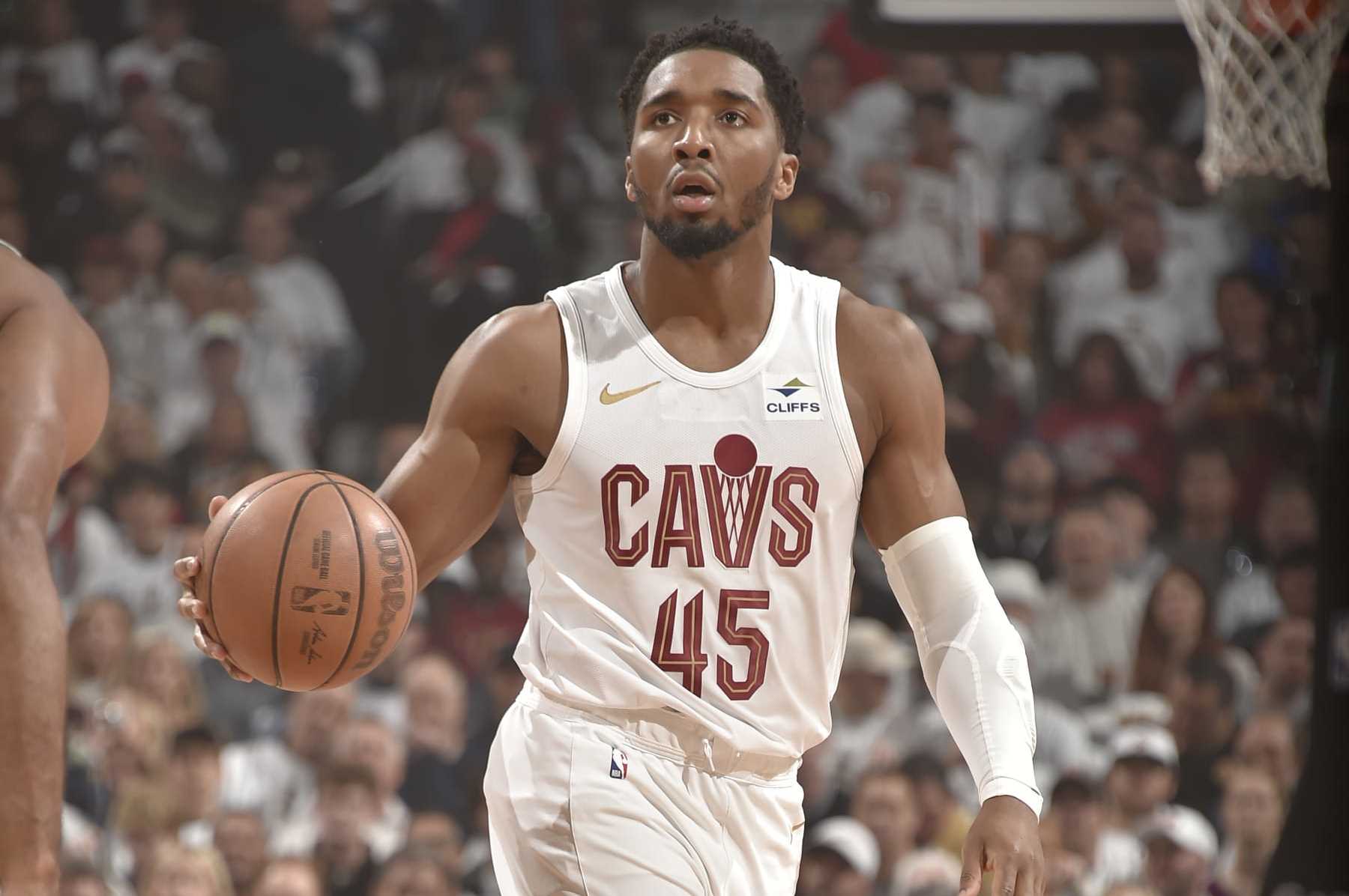 CLEVELAND, OH - MAY 11: Donovan Mitchell #45 of the Cleveland Cavaliers dribbles the ball during the game against the Boston Celtics during Round 2 Game 3 of the 2024 NBA Playoffs on May 11, 2024 at Rocket Mortgage FieldHouse in Cleveland, Ohio. NOTE TO USER: User expressly acknowledges and agrees that, by downloading and/or using this Photograph, user is consenting to the terms and conditions of the Getty Images License Agreement. Mandatory Copyright Notice: Copyright 2024 NBAE (Photo by David Liam Kyle/NBAE via Getty Images)