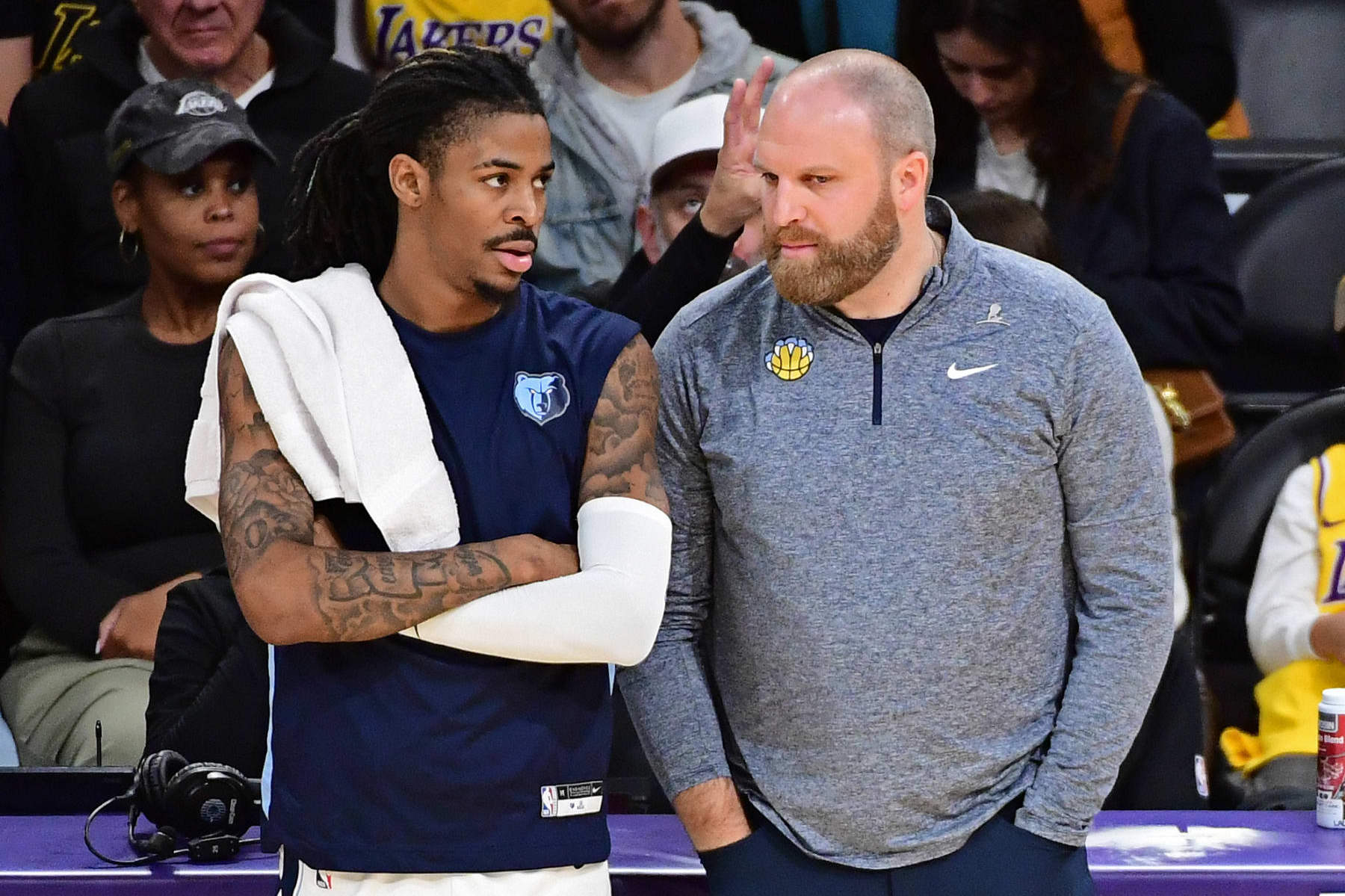 LOS ANGELES, CA - JANUARY 5: Ja Morant #12 and Head Coach Taylor Jenkins of the Memphis Grizzlies talk during the game against the Los Angeles Lakers on January 5, 2024 at Crypto.Com Arena in Los Angeles, California. NOTE TO USER: User expressly acknowledges and agrees that, by downloading and/or using this Photograph, user is consenting to the terms and conditions of the Getty Images License Agreement. Mandatory Copyright Notice: Copyright 2024 NBAE (Photo by Adam Pantozzi/NBAE via Getty Images)