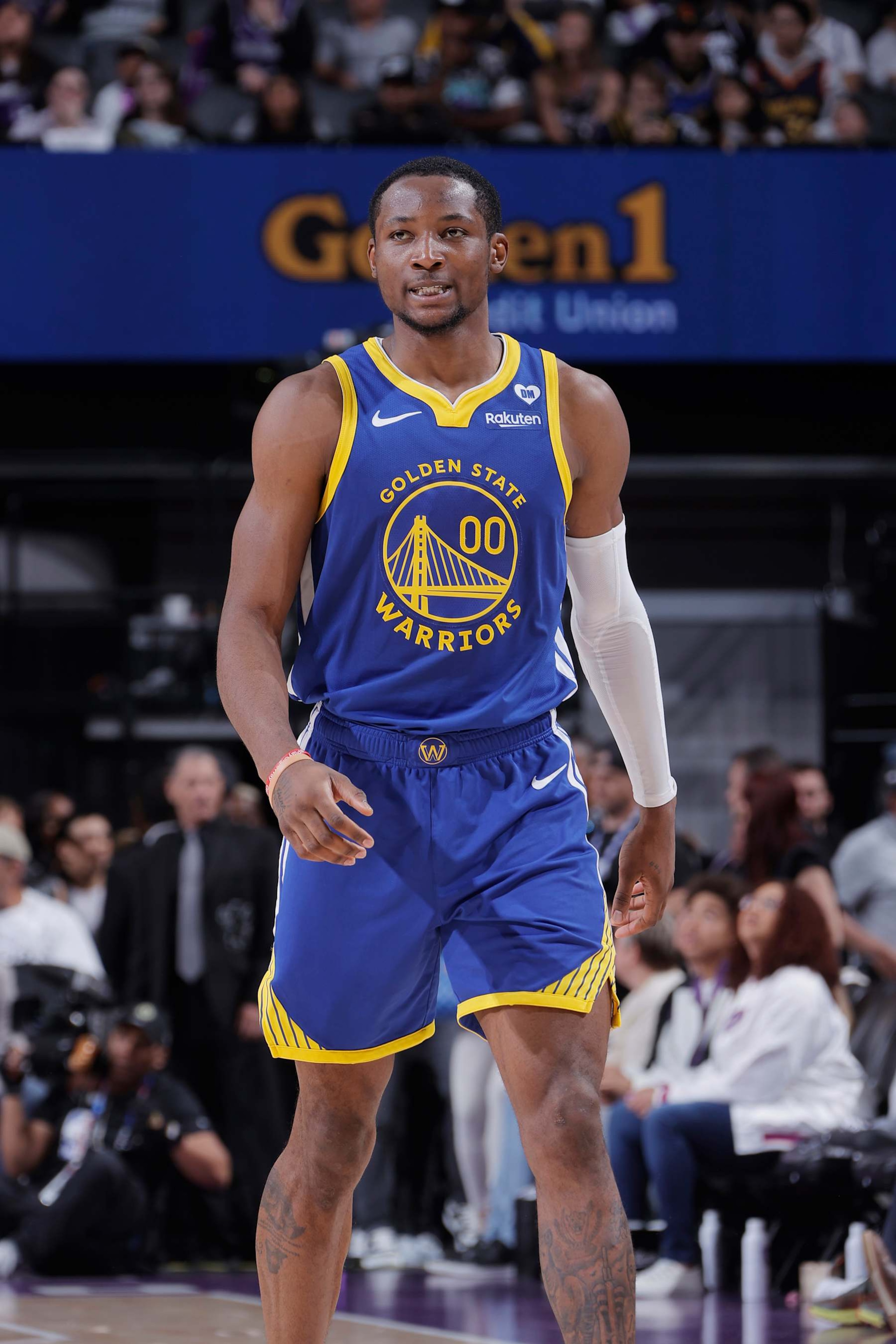 SACRAMENTO, CA - APRIL 16: Jonathan Kuminga #00 of the Golden State Warriors looks on during the game against the Sacramento Kings during the 2024 Play-In Tournament on April 16, 2024 at Golden 1 Center in Sacramento, California. NOTE TO USER: User expressly acknowledges and agrees that, by downloading and or using this photograph, User is consenting to the terms and conditions of the Getty Images Agreement. Mandatory Copyright Notice: Copyright 2024 NBAE (Photo by Rocky Widner/NBAE via Getty Images)