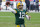GREEN BAY, WISCONSIN - JANUARY 24: Aaron Rodgers #12 of the Green Bay Packers throws a pass in the third quarter against the Tampa Bay Buccaneers during the NFC Championship game at Lambeau Field on January 24, 2021 in Green Bay, Wisconsin. (Photo by Dylan Buell/Getty Images)
