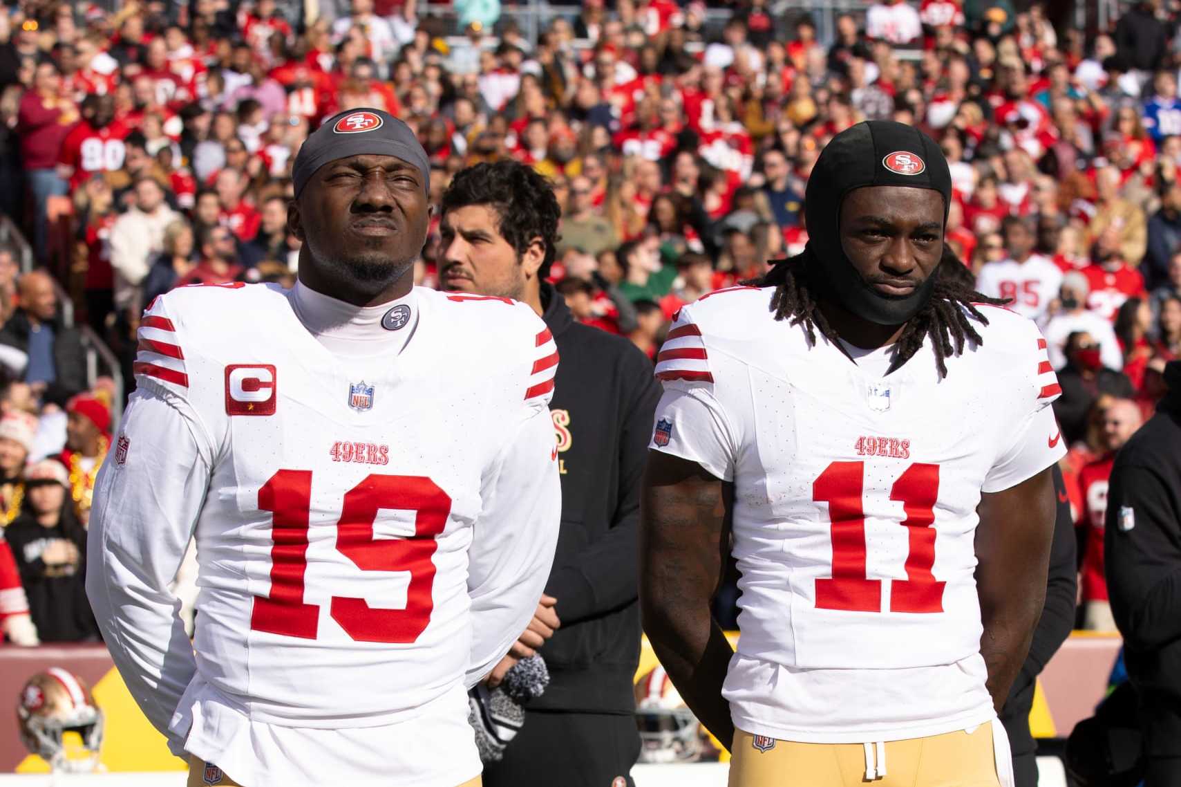 LANDOVER, MD - DECEMBER 31: Deebo Samuel #19 and Brandon Aiyuk #11 of the San Francisco 49ers on the sideline before the game against the Washington Commanders at FedEx Field on December 31, 2023 in Landover, Maryland. The 49ers defeated the Commanders 27-10. (Photo by Michael Zagaris/San Francisco 49ers/Getty Images)