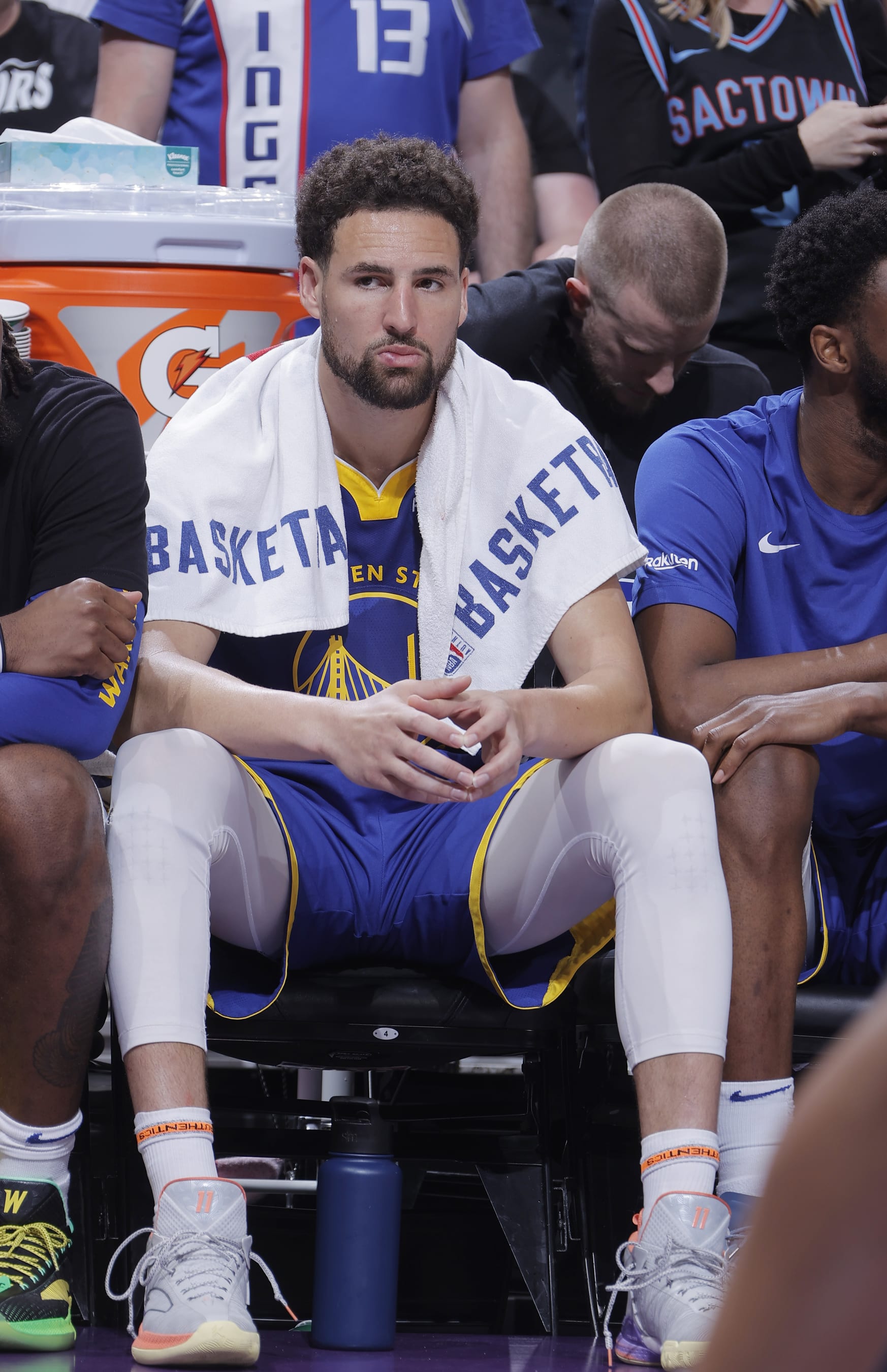 SACRAMENTO, CA - APRIL 16: Klay Thompson #11 of the Golden State Warriors looks on from the bench during the game against the Sacramento Kings during the 2024 Play-In Tournament on April 16, 2024 at Golden 1 Center in Sacramento, California. NOTE TO USER: User expressly acknowledges and agrees that, by downloading and or using this photograph, User is consenting to the terms and conditions of the Getty Images Agreement. Mandatory Copyright Notice: Copyright 2024 NBAE (Photo by Rocky Widner/NBAE via Getty Images)