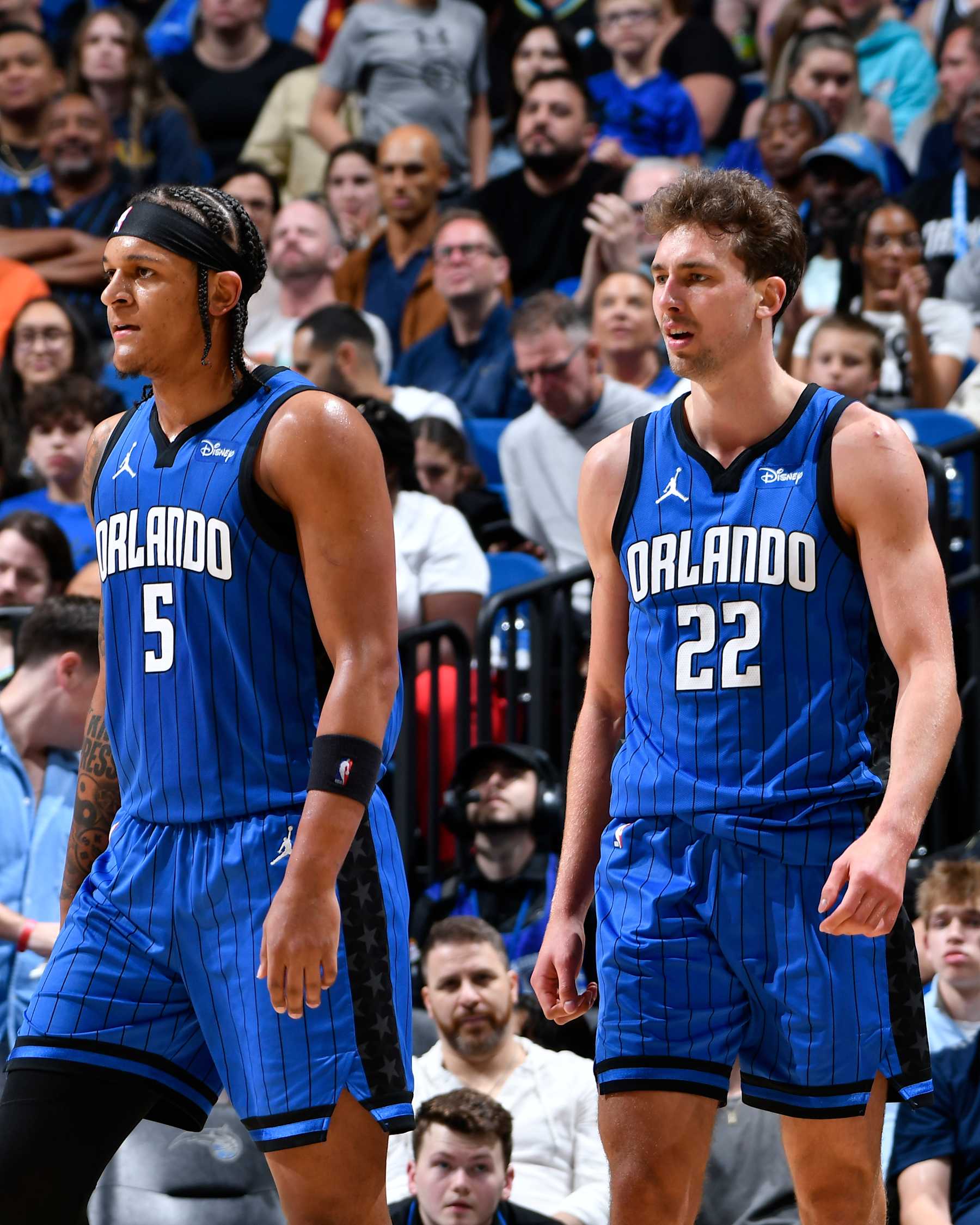 ORLANDO, FL - MARCH 10: Paolo Banchero #5 of the Orlando Magic & Franz Wagner #22 of the Orlando Magic looks on during the game on March 10, 2024 at Kia Center in Orlando, Florida. NOTE TO USER: User expressly acknowledges and agrees that, by downloading and or using this photograph, User is consenting to the terms and conditions of the Getty Images License Agreement. Mandatory Copyright Notice: Copyright 2024 NBAE (Photo by Fernando Medina/NBAE via Getty Images)