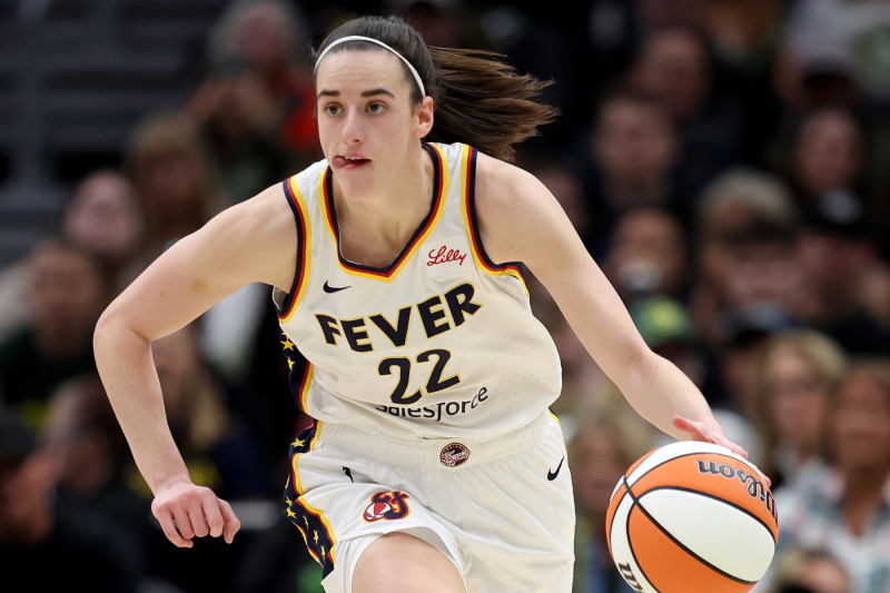 SEATTLE, WASHINGTON - JUNE 27: Caitlin Clark #22 of the Indiana Fever dribbles during the second quarter against the Seattle Storm at Climate Pledge Arena on June 27, 2024 in Seattle, Washington. NOTE TO USER: User expressly acknowledges and agrees that, by downloading and or using this photograph, User is consenting to the terms and conditions of the Getty Images License Agreement. (Photo by Steph Chambers/Getty Images)