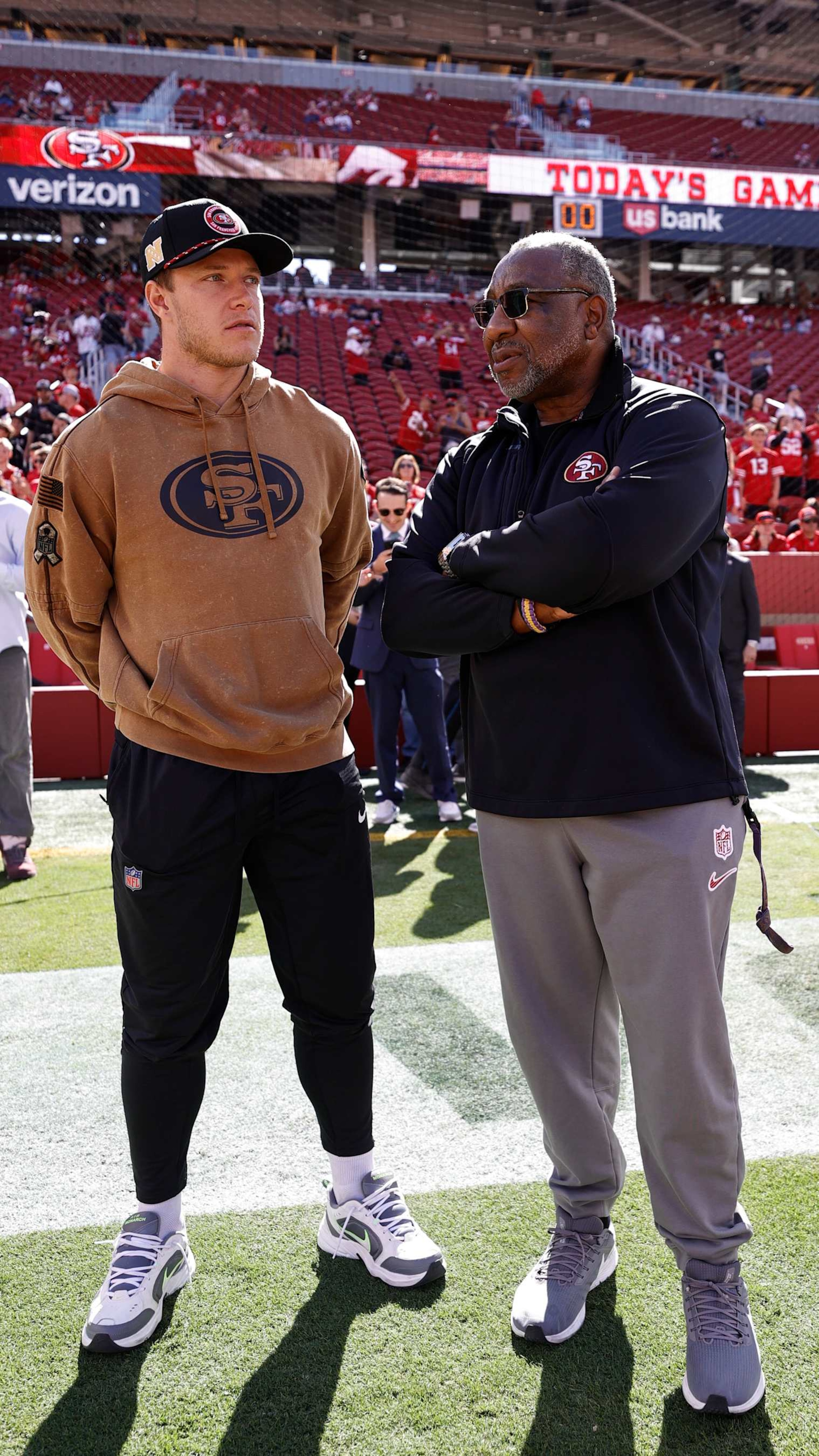 SANTA CLARA, CA - OCTOBER 20: Christian McCaffrey #23 and Pastor Earl Smith of the San Francisco 49ers before the game against the Kansas City Chiefs at Levi's Stadium on October 20, 2024 in Santa Clara, California. The Chiefs defeated the 49ers 28-18. (Photo by Michael Zagaris/San Francisco 49ers/Getty Images)