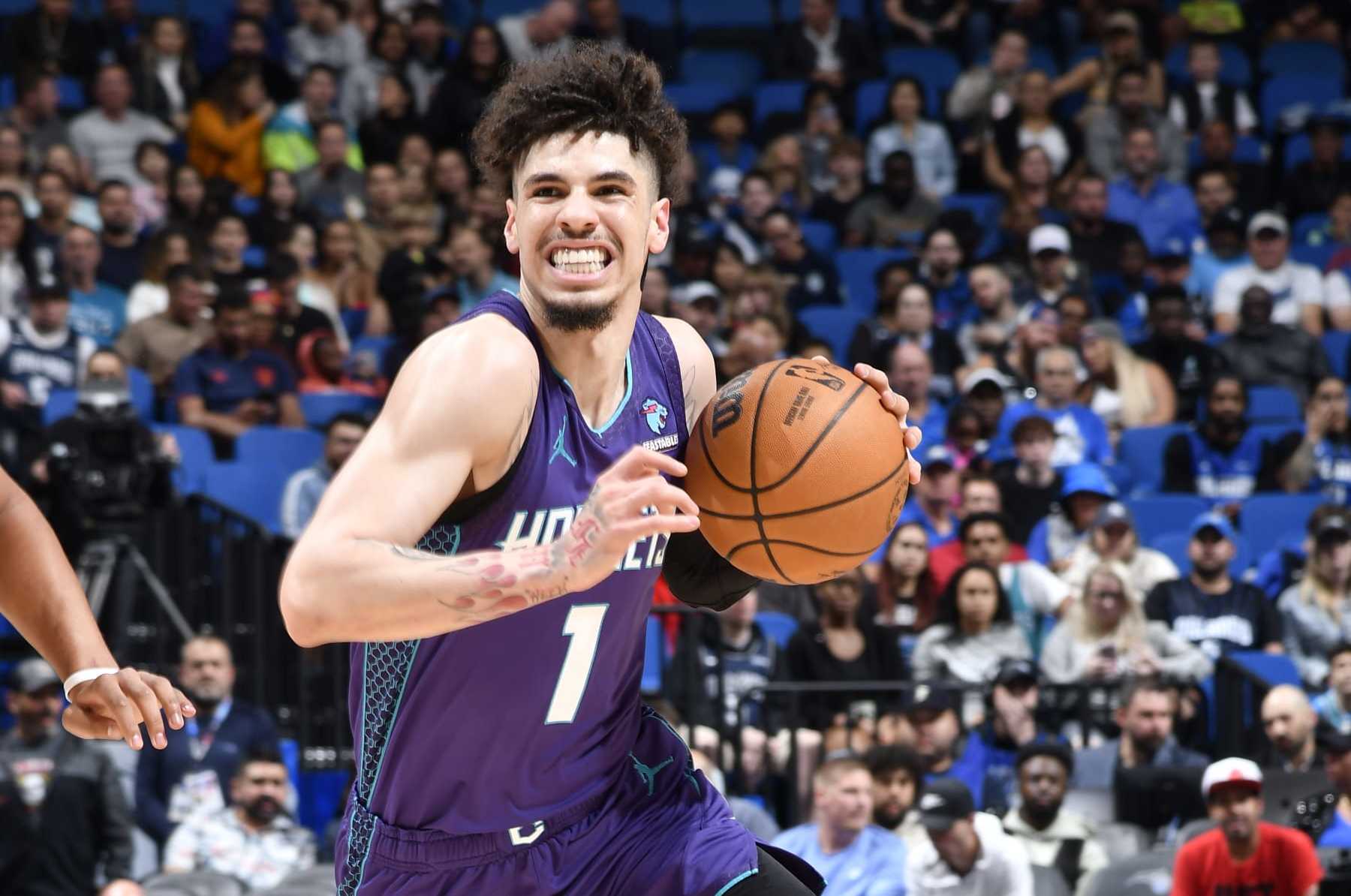 ORLANDO, FL - NOVEMBER 26: LaMelo Ball #1 of the Charlotte Hornets drives to the basket during the game against the Orlando Magic on November 26, 2023 at Amway Center in Orlando, Florida. NOTE TO USER: User expressly acknowledges and agrees that, by downloading and or using this photograph, User is consenting to the terms and conditions of the Getty Images License Agreement. Mandatory Copyright Notice: Copyright 2023 NBAE (Photo by Fernando Medina/NBAE via Getty Images)