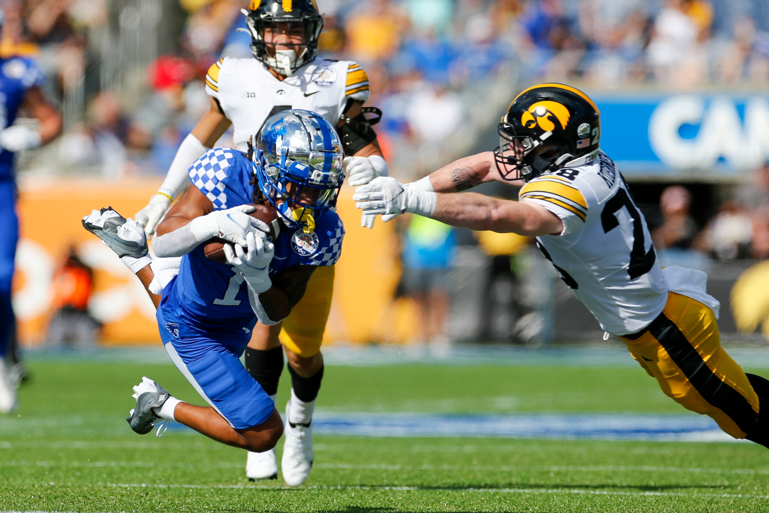 ORLANDO, FL - JANUARY 01: Kentucky Wildcats wide receiver Wan'Dale Robinson (1) catches a pass during the Vrbo Citrus Bowl game between the Iowa Hawkeyes and the Kentucky Wildcats on January 1, 2022 at Camping World Stadium in Orlando, Fl. (Photo by David Rosenblum/Icon Sportswire via Getty Images)