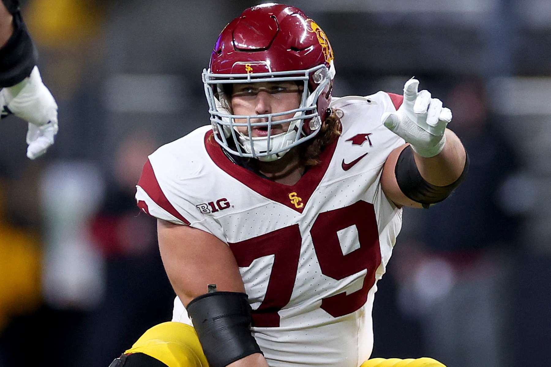 SEATTLE, WASHINGTON - NOVEMBER 02: Jonah Monheim #79 of the USC Trojans in action against the Washington Huskies at Husky Stadium on November 02, 2024 in Seattle, Washington. (Photo by Steph Chambers/Getty Images)