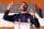 Gold medallist Novak Djokovic of Team Serbia sings the Serbian National anthem on the podium during the Tennis Men's Singles medal ceremony after the Tennis Men's Singles Gold medal match on day nine of the Olympic Games Paris 2024 at Roland Garros on August 04, 2024 in Paris, France. (Photo by Tnani Badreddine/DeFodi Images via Getty Images)