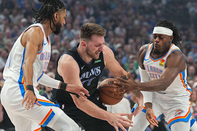 DALLAS, TX - MAY 18: Luguentz Dort #5 of the Oklahoma City Thunder steals the ball from Luka Doncic #77 of the Dallas Mavericks during the game during Round 2 Game 6 of the 2024 NBA Playoffs on May 18, 2024 at the American Airlines Center in Dallas, Texas. NOTE TO USER: User expressly acknowledges and agrees that, by downloading and or using this photograph, User is consenting to the terms and conditions of the Getty Images License Agreement. Mandatory Copyright Notice: Copyright 2024 NBAE (Photo by Glenn James/NBAE via Getty Images)
