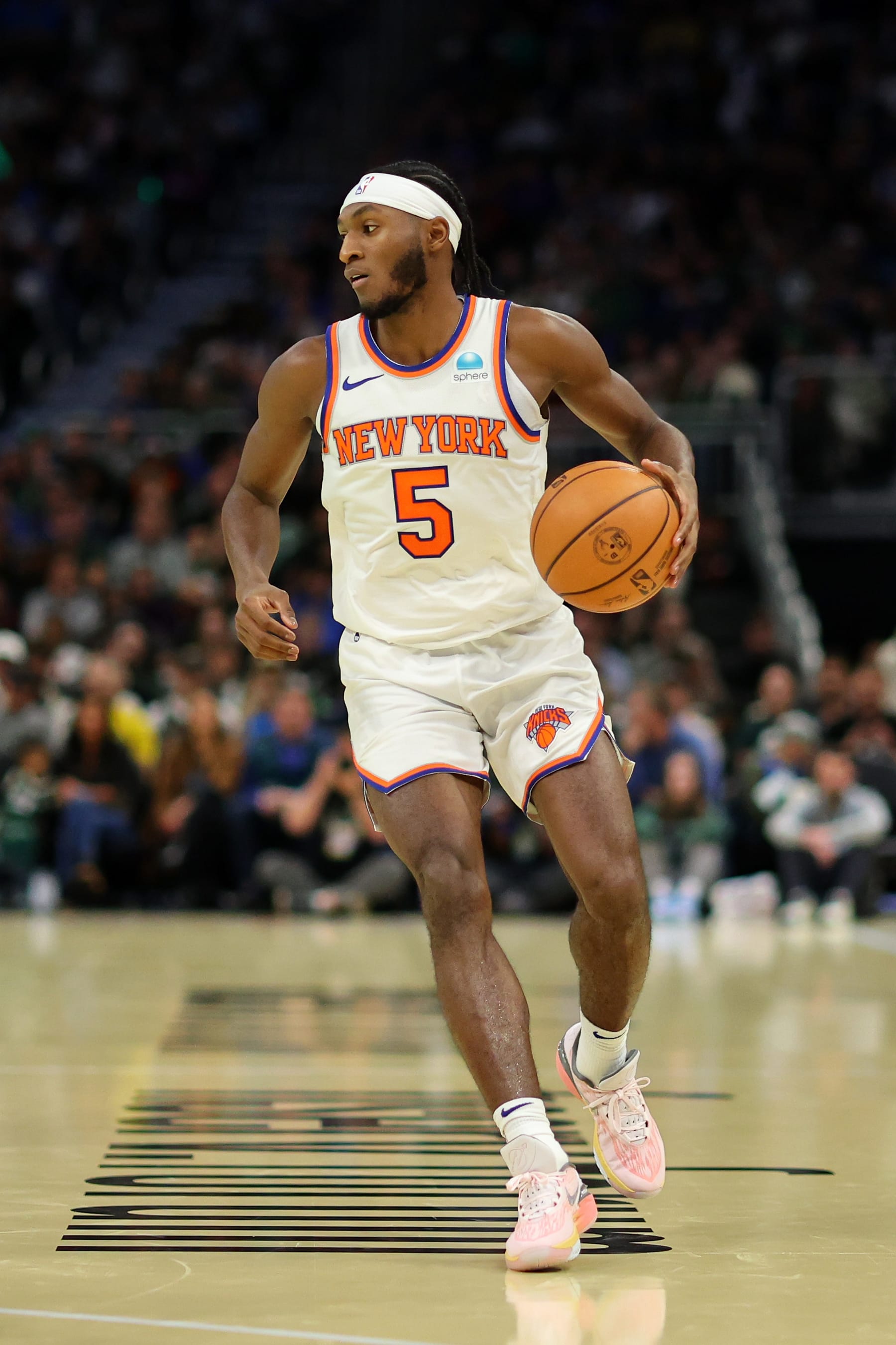MILWAUKEE, WISCONSIN - DECEMBER 05: Immanuel Quickley #5 of the NNew York Knicks takes on the Milwaukee Bucks during the NBA In-Season Tournament Quarterfinal at Fiserv Forum on December 05, 2023 in Milwaukee, Wisconsin. NOTE TO USER: User expressly acknowledges and agrees that, by downloading and or using this photograph, User is consenting to the terms and conditions of the Getty Images License Agreement. (Photo by Stacy Revere/Getty Images)