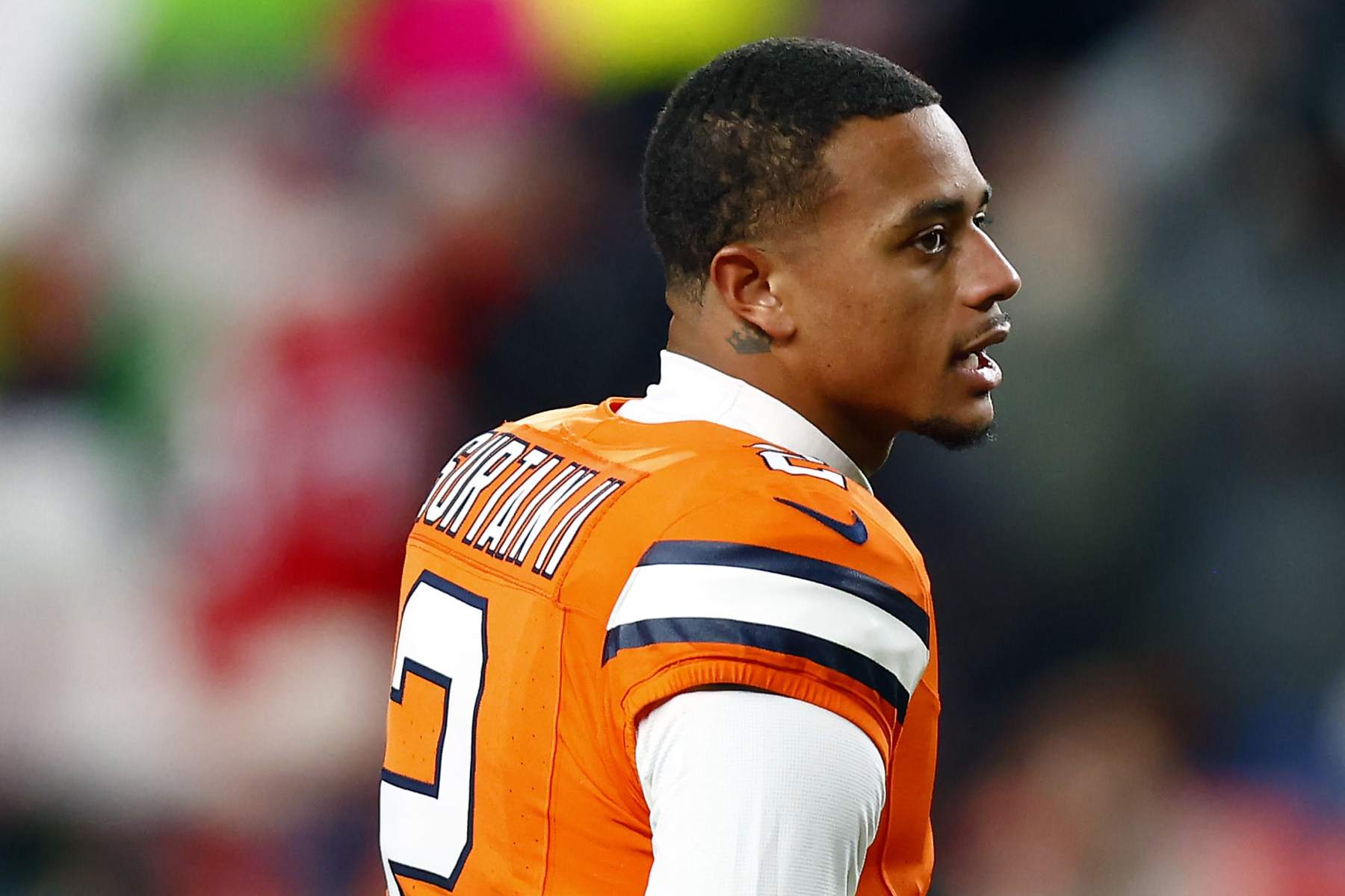 DENVER, COLORADO - DECEMBER 24: Cornerback Pat Surtain II #2of the Denver Broncos stretches prior to the game against the New England Patriots at Empower Field At Mile High on December 24, 2023 in Denver, Colorado. (Photo by Justin Edmonds/Getty Images)