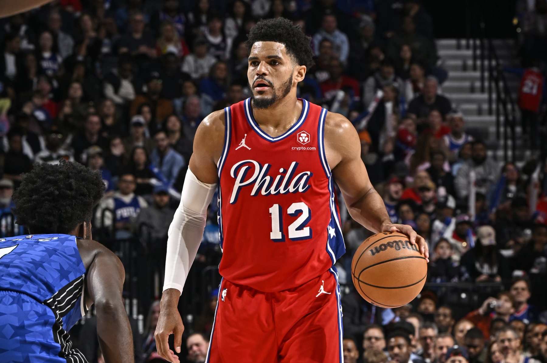 PHILADELPHIA, PA - APRIL 12: Tobias Harris #12 of the Philadelphia 76ers dribbles the ball during the game against the Orlando Magic on April 12, 2024 at the Wells Fargo Center in Philadelphia, Pennsylvania NOTE TO USER: User expressly acknowledges and agrees that, by downloading and/or using this Photograph, user is consenting to the terms and conditions of the Getty Images License Agreement. Mandatory Copyright Notice: Copyright 2024 NBAE (Photo by David Dow/NBAE via Getty Images)