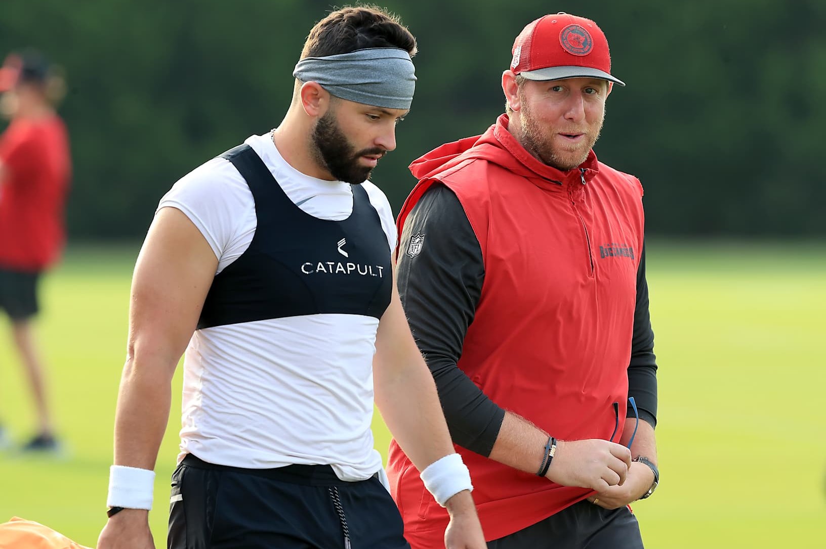 TAMPA, FL - AUG 07: Tampa Bay Buccaneers Quarterback Baker Mayfield (6) walks with Offensive Coordinator Liam Coen during Training Camp on August 07, 2024 at the AdventHealth Training Center at One Buccaneer Place in Tampa, Florida. (Photo by Cliff Welch/Icon Sportswire via Getty Images)
