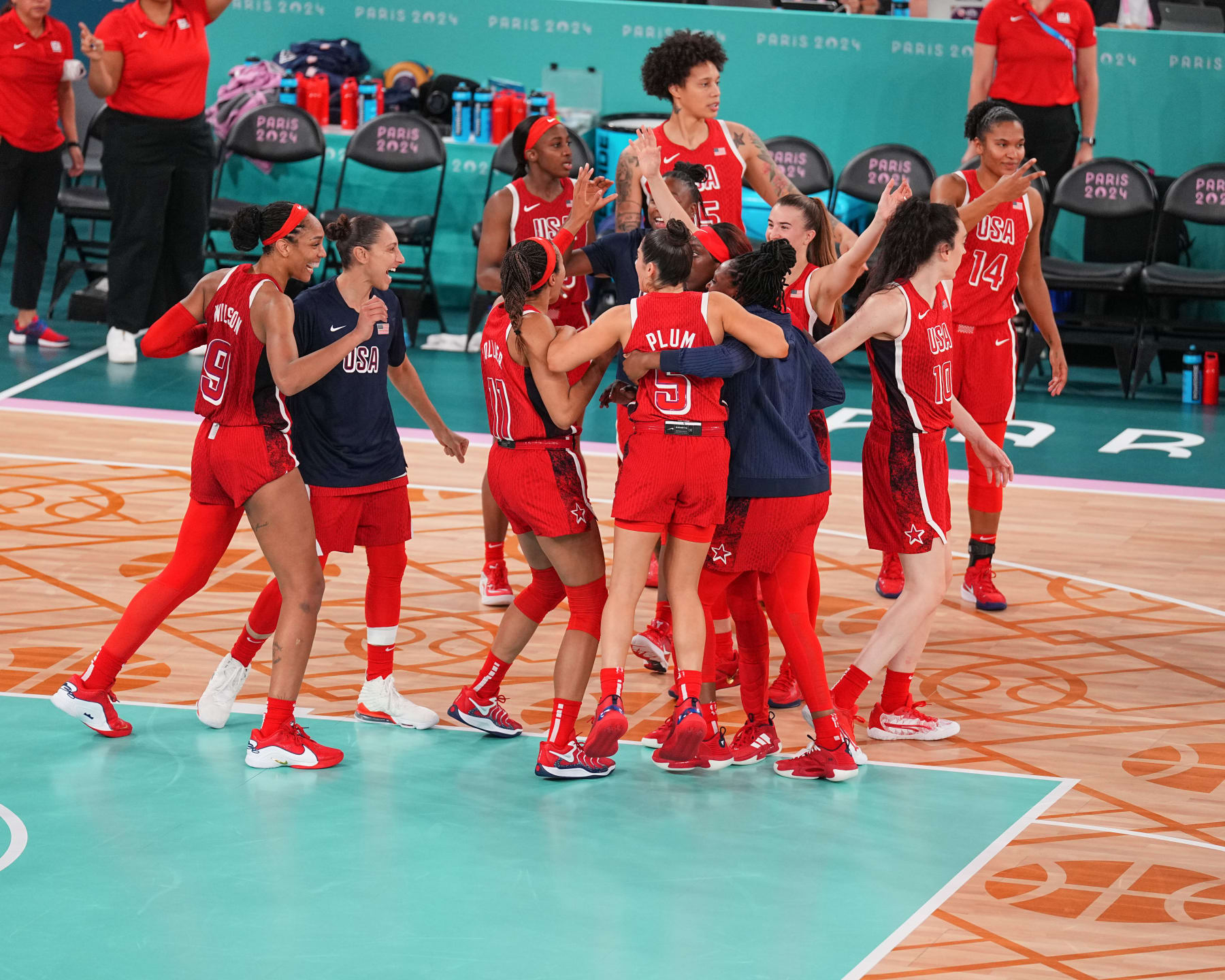 PARIS, FRANCE - AUGUST 11:   The USA Women's National Team embrace after the game during the Women's Gold Medal game at the  AccorHotels Arena on August 11, 2024 in Lille, France. NOTE TO USER: User expressly acknowledges and agrees that, by downloading and/or using this photograph, user is consenting to the terms and conditions of the Getty Images License Agreement. Mandatory Copyright Notice: Copyright 2024 NBAE (Photo by Garrett W. Ellwood/NBAE via Getty Images)