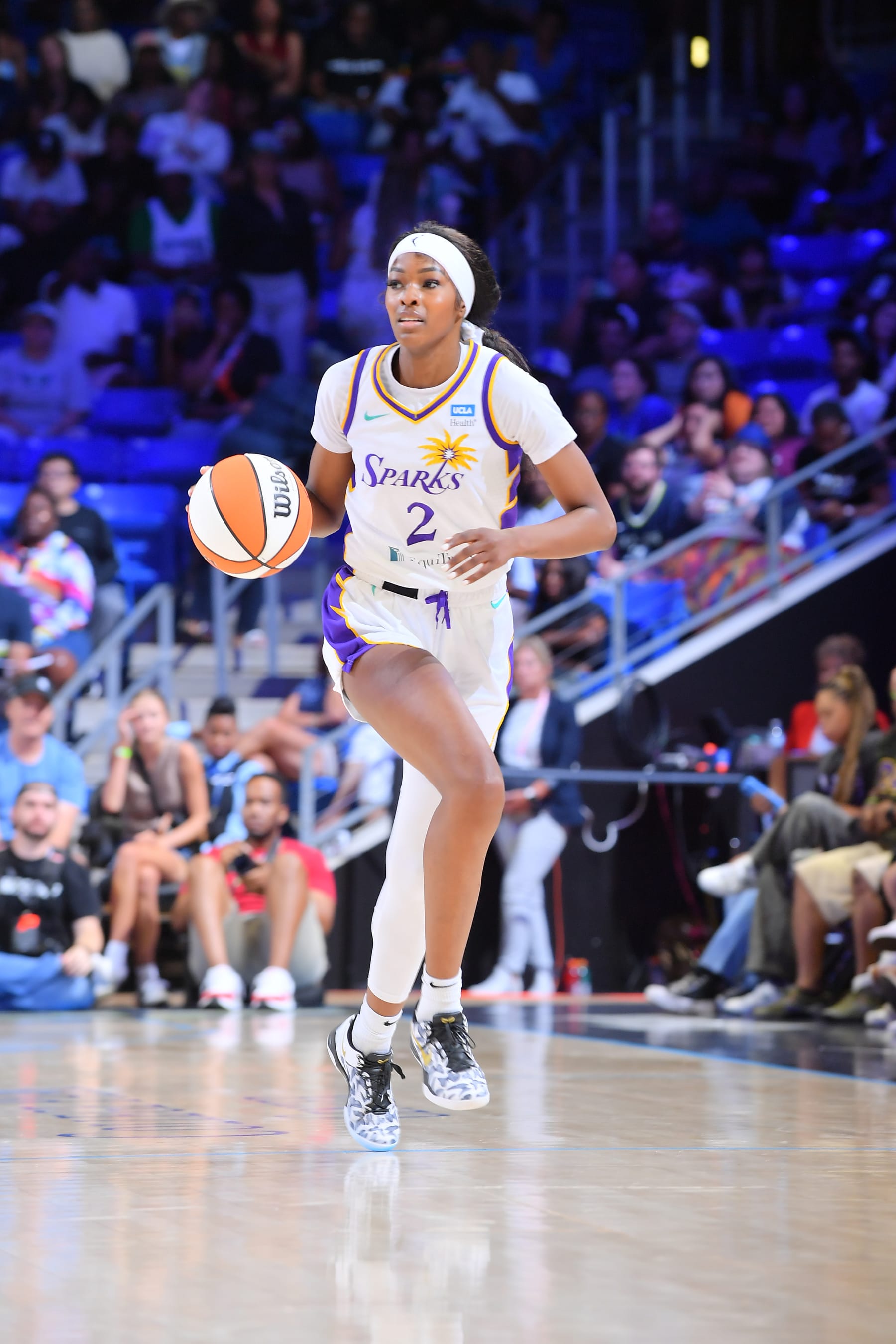 ARLINGTON, TX -  JULY 13: Rickea Jackson #2 of the Los Angeles Sparks dribbles the ball during the game against the Dallas Wings on July 13, 2024 at the College Park Center in Arlington, TX. NOTE TO USER: User expressly acknowledges and agrees that, by downloading and or using this photograph, User is consenting to the terms and conditions of the Getty Images License Agreement. Mandatory Copyright Notice: Copyright 2024 NBAE (Photo by Michael Gonzales/NBAE via Getty Images)