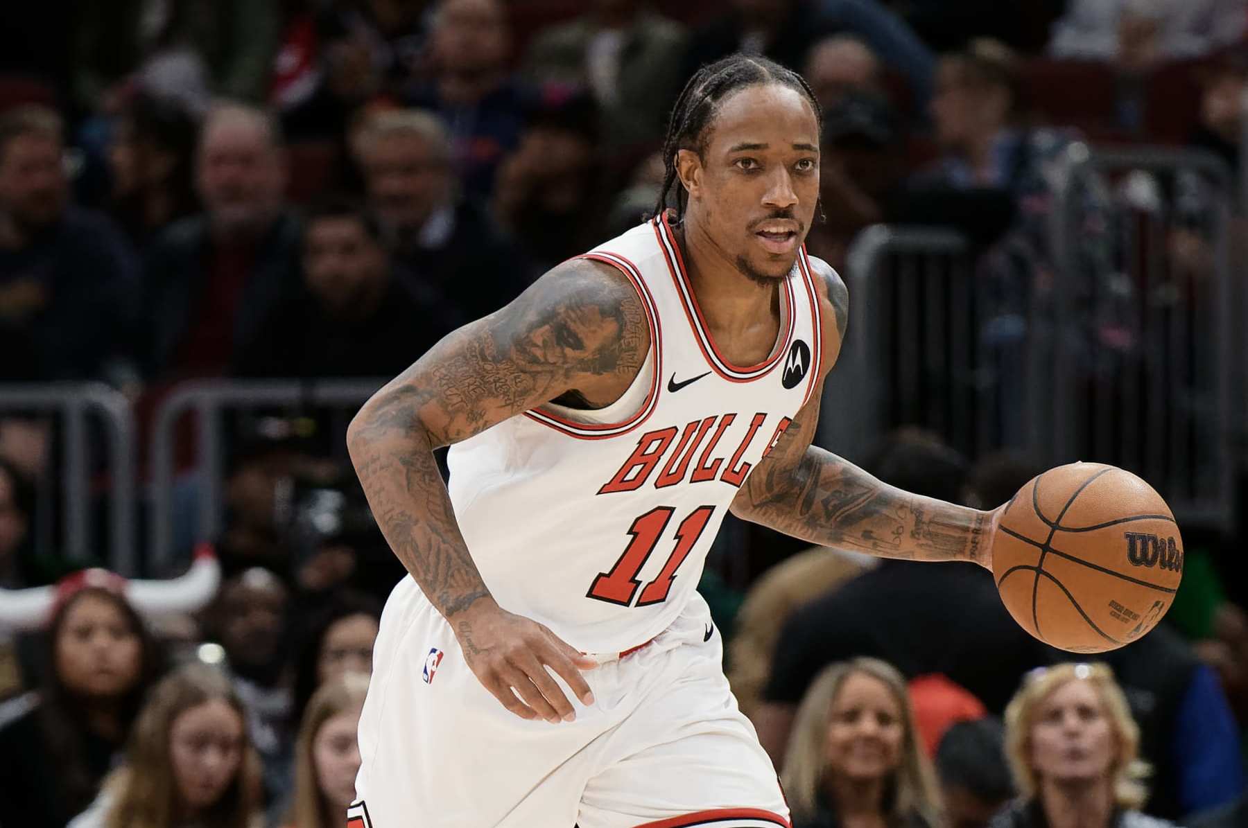 CHICAGO, ILLINOIS - MARCH 16: DeMar DeRozan #11 of the Chicago Bulls controls the ball against the Washington Wizards on March 16, 2024 at United Center in Chicago, Illinois. Chicago defeated Washington 127-98. NOTE TO USER: User expressly acknowledges and agrees that, by downloading and or using this photograph, User is consenting to the terms and conditions of the Getty Images License Agreement. (Photo by Jamie Sabau/Getty Images)
