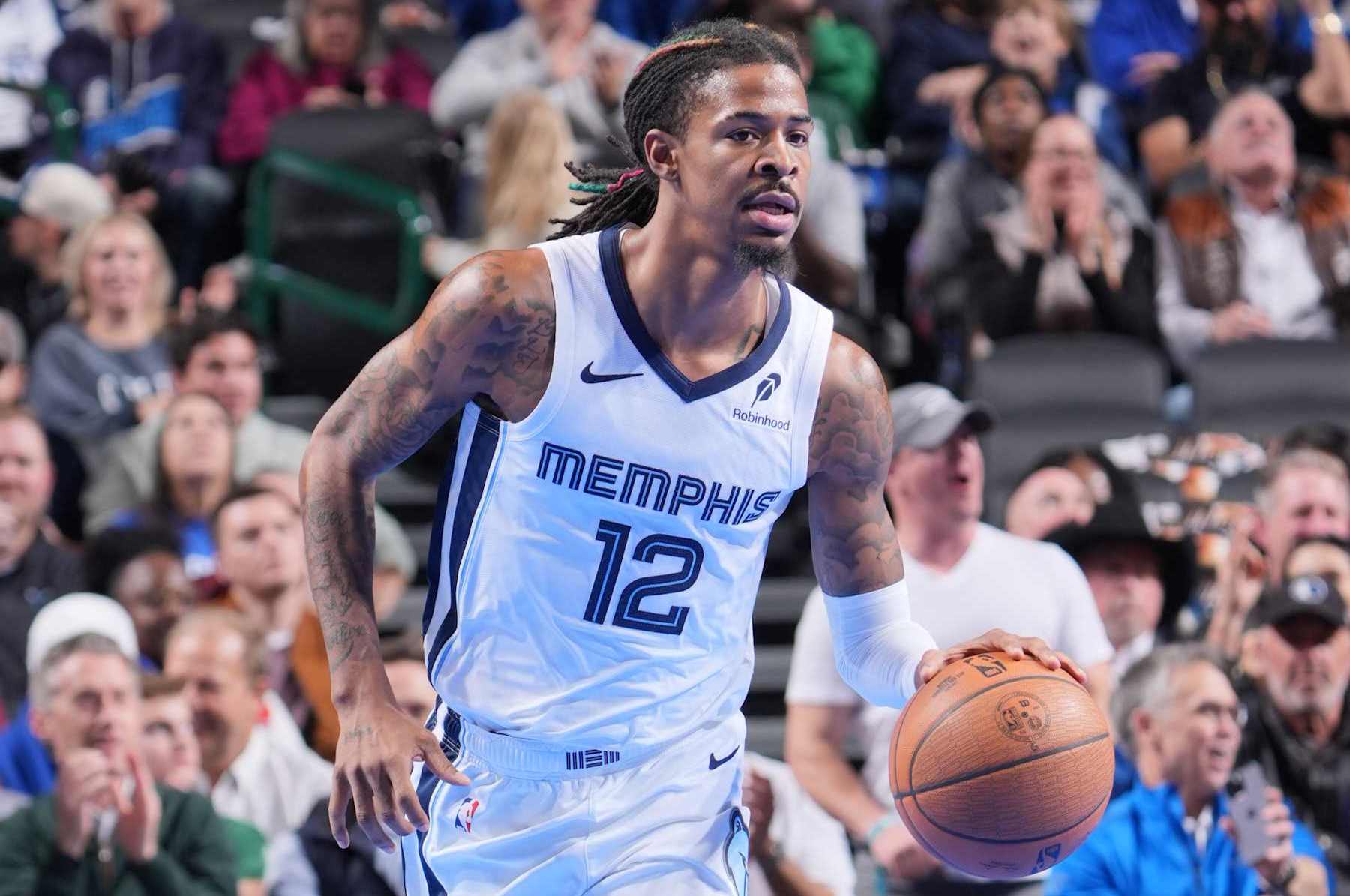 DALLAS, TX - DECEMBER 3: Ja Morant #12 of the Memphis Grizzlies dribbles the ball during the game against the Dallas Mavericks during a Emirates NBA Cup game on December 3, 2024 at American Airlines Center in Dallas, Texas. NOTE TO USER: User expressly acknowledges and agrees that, by downloading and or using this photograph, User is consenting to the terms and conditions of the Getty Images License Agreement. Mandatory Copyright Notice: Copyright 2024 NBAE (Photo by Glenn James/NBAE via Getty Images)