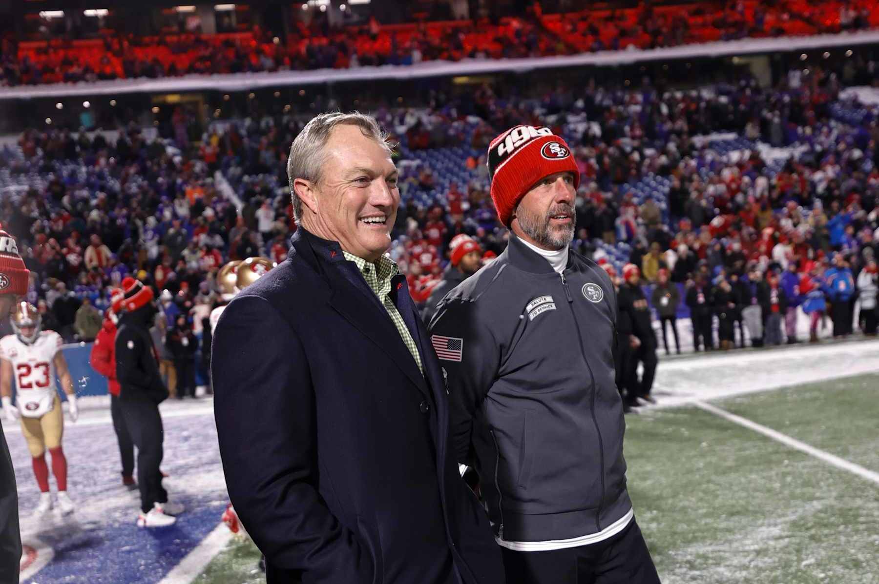 ORCHARD PARK, NY - DECEMBER 1: President of Football Operations and General Manager John Lynch and Head Coach Kyle Shanahan of the San Francisco 49ers before the game against the Buffalo Bills at Highmark Stadium on December 1, 2024 in Orchard Park, New York. The Bills defeated the 49ers 35-10. (Photo by Michael Zagaris/San Francisco 49ers/Getty Images)