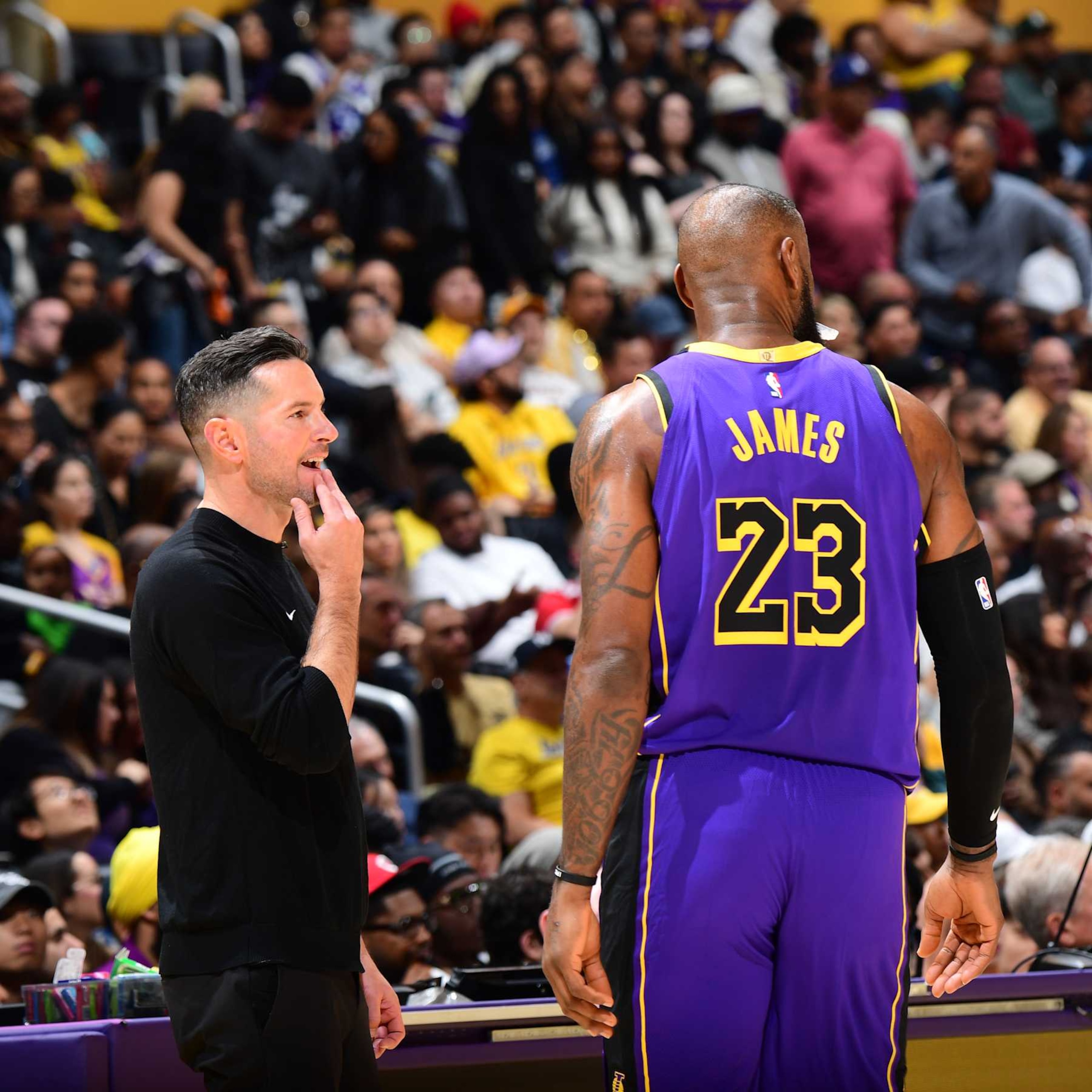 LOS ANGELES, CA - OCTOBER 25: LeBron James #23 and Head Coach JJ Redick of the Los Angeles Lakers talk during the game on October 25, 2024 at Crypto.Com Arena in Los Angeles, California. NOTE TO USER: User expressly acknowledges and agrees that, by downloading and/or using this Photograph, user is consenting to the terms and conditions of the Getty Images License Agreement. Mandatory Copyright Notice: Copyright 2024 NBAE (Photo by Adam Pantozzi/NBAE via Getty Images) LOS ANGELES, CA - OCTOBER 25: LeBron James #23 and Head Coach JJ Redick of the Los Angeles Lakers talk during the game on October 25, 2024 at Crypto.Com Arena in Los Angeles, California. NOTE TO USER: User expressly acknowledges and agrees that, by downloading and/or using this Photograph, user is consenting to the terms and conditions of the Getty Images License Agreement. Mandatory Copyright Notice: Copyright 2024 NBAE (Photo by Adam Pantozzi/NBAE via Getty Images)