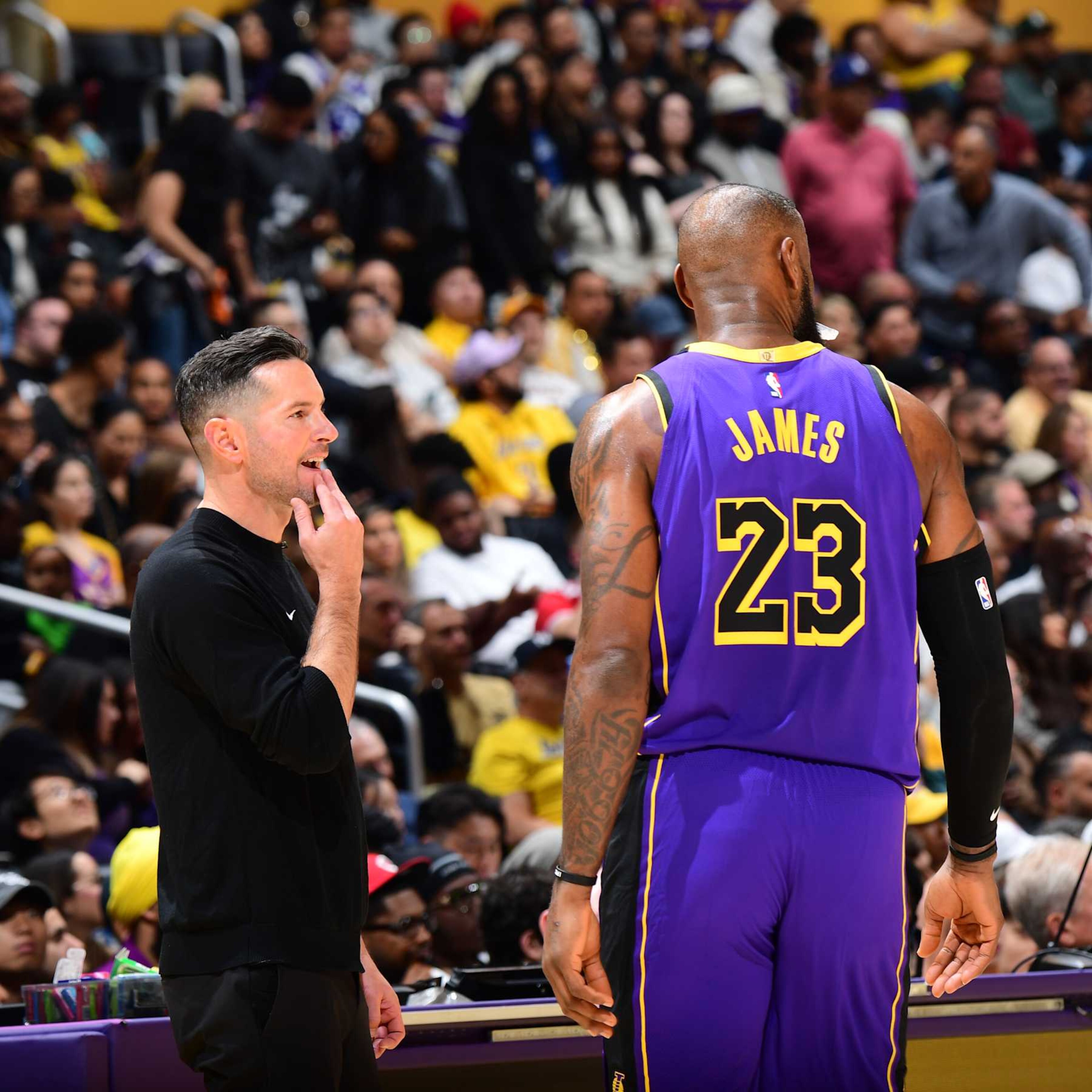 LOS ANGELES, CA - OCTOBER 25: LeBron James #23 and Head Coach JJ Redick of the Los Angeles Lakers talk during the game on October 25, 2024 at Crypto.Com Arena in Los Angeles, California. NOTE TO USER: User expressly acknowledges and agrees that, by downloading and/or using this Photograph, user is consenting to the terms and conditions of the Getty Images License Agreement. Mandatory Copyright Notice: Copyright 2024 NBAE (Photo by Adam Pantozzi/NBAE via Getty Images) LOS ANGELES, CA - OCTOBER 25: LeBron James #23 and Head Coach JJ Redick of the Los Angeles Lakers talk during the game on October 25, 2024 at Crypto.Com Arena in Los Angeles, California. NOTE TO USER: User expressly acknowledges and agrees that, by downloading and/or using this Photograph, user is consenting to the terms and conditions of the Getty Images License Agreement. Mandatory Copyright Notice: Copyright 2024 NBAE (Photo by Adam Pantozzi/NBAE via Getty Images)