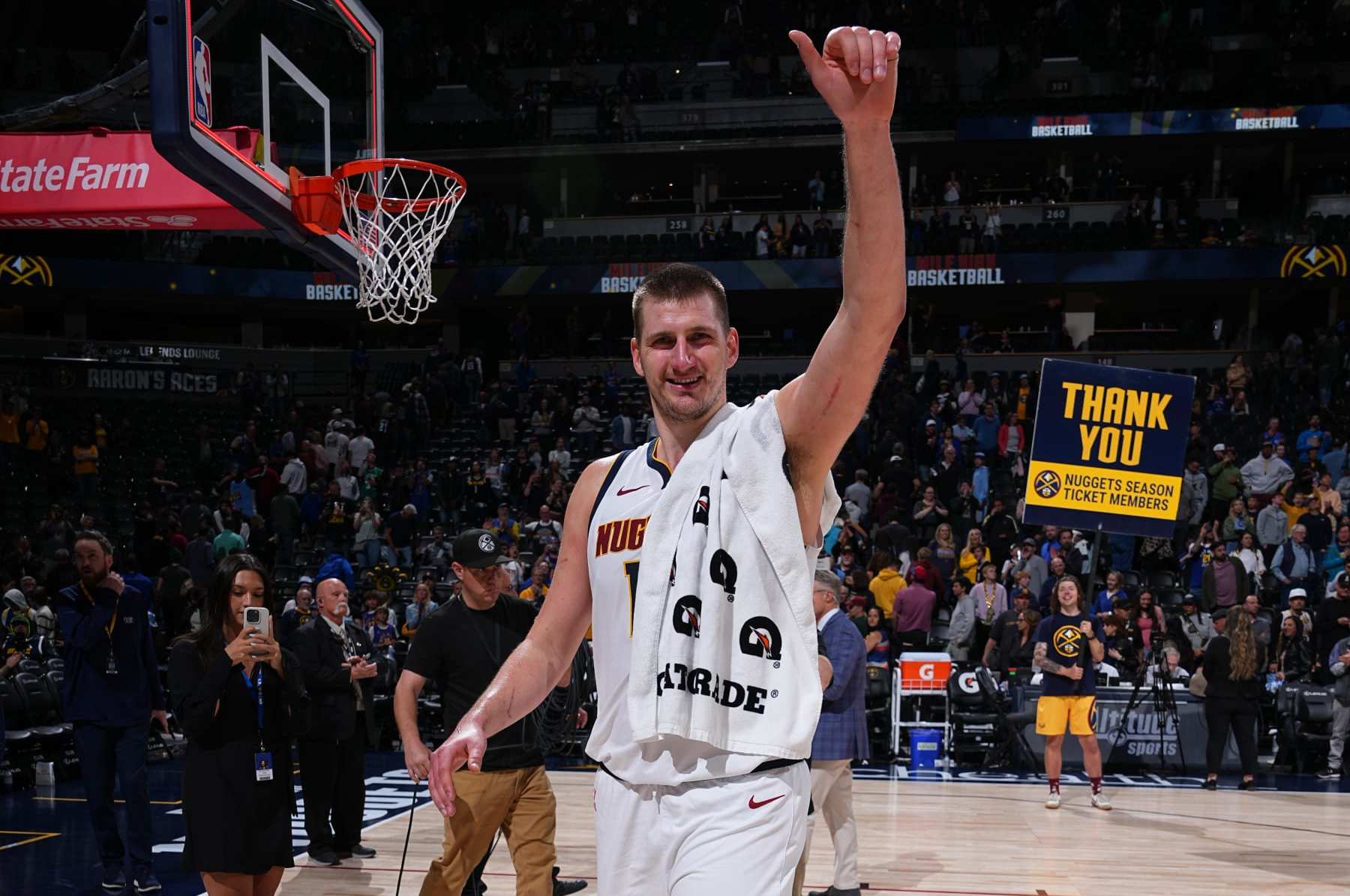 DENVER, CO - APRIL 2: Nikola Jokic #15 of the Denver Nuggets smiles after the game against the San Antonio Spurs on April 2, 2024 at the Ball Arena in Denver, Colorado. NOTE TO USER: User expressly acknowledges and agrees that, by downloading and/or using this Photograph, user is consenting to the terms and conditions of the Getty Images License Agreement. Mandatory Copyright Notice: Copyright 2024 NBAE (Photo by Garrett Ellwood/NBAE via Getty Images)