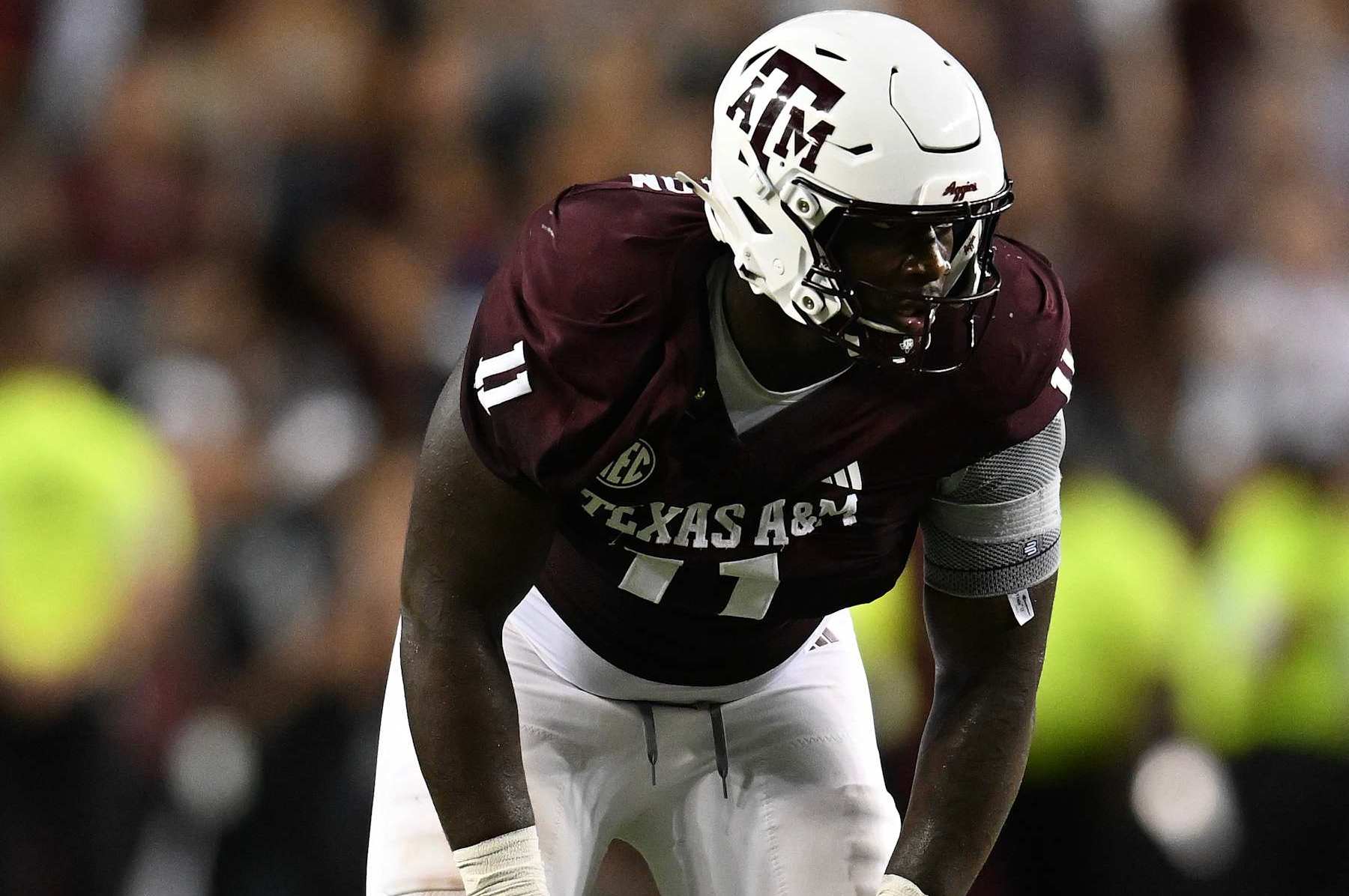 COLLEGE STATION, TEXAS - AUGUST 31: Nic Scourton #11 of the Texas A&M Aggies lines up against the Notre Dame Fighting Irish during the fourth quarter at Kyle Field on August 31, 2024 in College Station, Texas. (Photo by Jack Gorman/Getty Images)