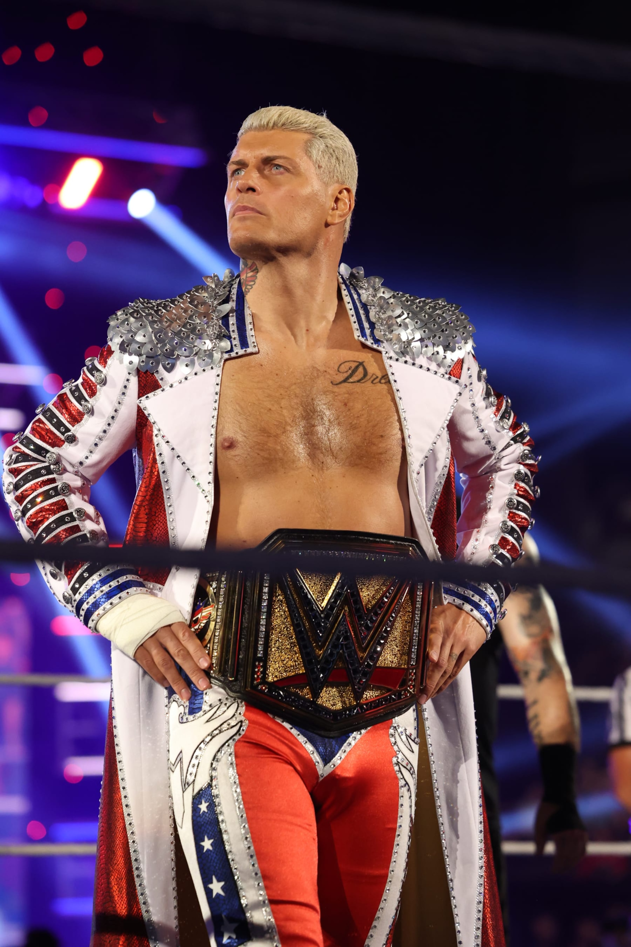 OMAHA, NEBRASKA - JULY 19: Undisputed WWE Champion Cody Rhodes makes his entrance during SmackDown at CHI Health Center on July 19, 2024 in Omaha, Nebraska.  (Photo by WWE/Getty Images)