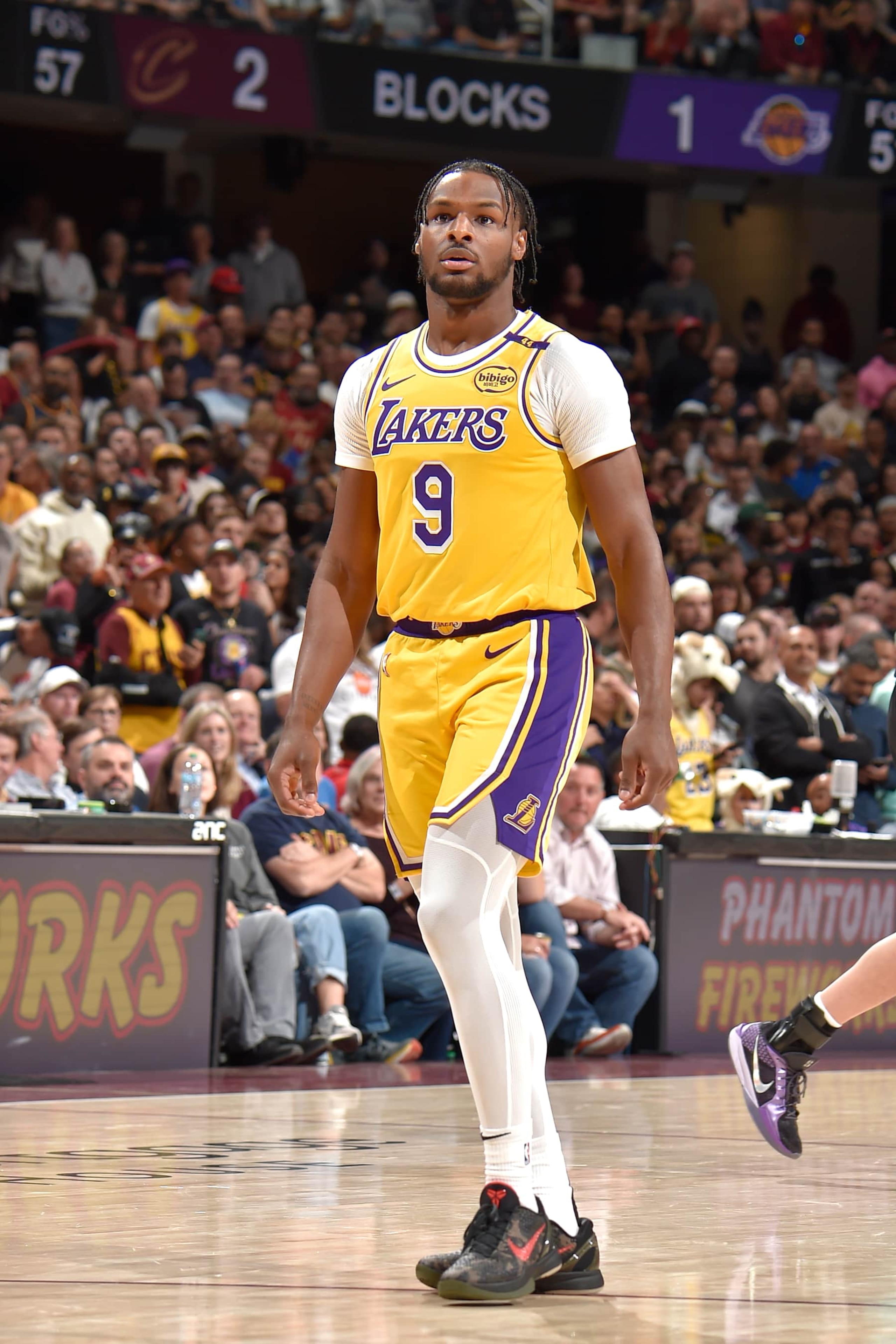 CLEVELAND, OH - OCTOBER 30: Bronny James #9 of the Los Angeles Lakers looks on during the game against the Cleveland Cavaliers on October 30, 2024 at Rocket Mortgage FieldHouse in Cleveland, Ohio. NOTE TO USER: User expressly acknowledges and agrees that, by downloading and/or using this Photograph, user is consenting to the terms and conditions of the Getty Images License Agreement. Mandatory Copyright Notice: Copyright 2024 NBAE (Photo by David Liam Kyle/NBAE via Getty Images)