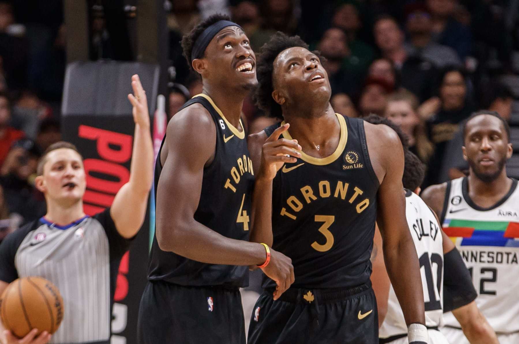 TORONTO, ON - MARCH 18: Pascal Siakam #43 and O.G. Anunoby #3 of the Toronto Raptors watch a replay of Anuoby's dunk on the big screen during the first half of their NBA game against the Minnesota Timberwolves at Scotiabank Arena on March 18, 2023 in Toronto, Canada. NOTE TO USER: User expressly acknowledges and agrees that, by downloading and or using this photograph, User is consenting to the terms and conditions of the Getty Images License Agreement. (Photo by Cole Burston/Getty Images)