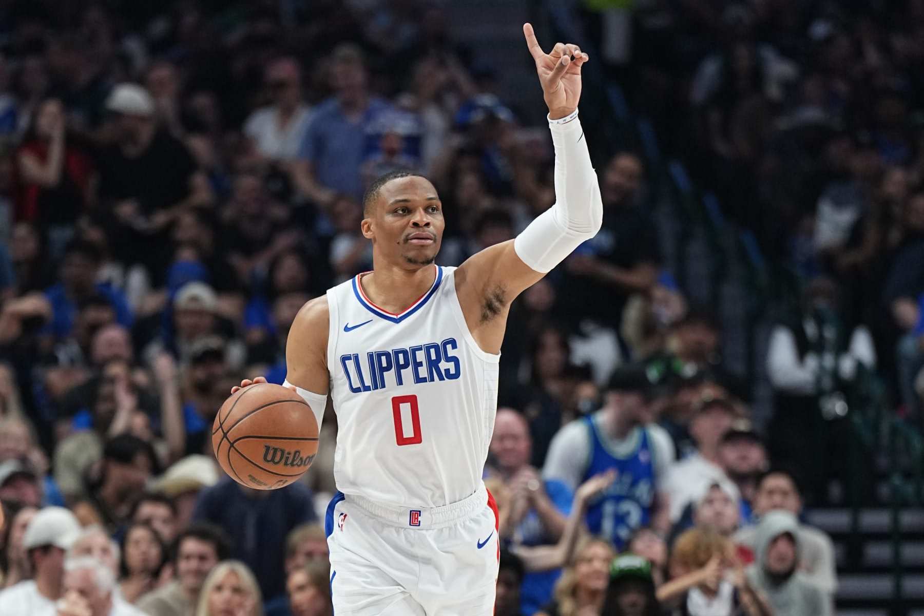 DALLAS, TX - MAY 3:  Russell Westbrook #0 of the LA Clippers handles the ball during the game  against the Dallas Mavericks during Round 1 Game 6 of the 2024 NBA Playoffs  on May 3, 2024  at the American Airlines Center in Dallas, Texas. NOTE TO USER: User expressly acknowledges and agrees that, by downloading and or using this photograph, User is consenting to the terms and conditions of the Getty Images License Agreement. Mandatory Copyright Notice: Copyright 2024 NBAE (Photo by Glenn James/NBAE via Getty Images)