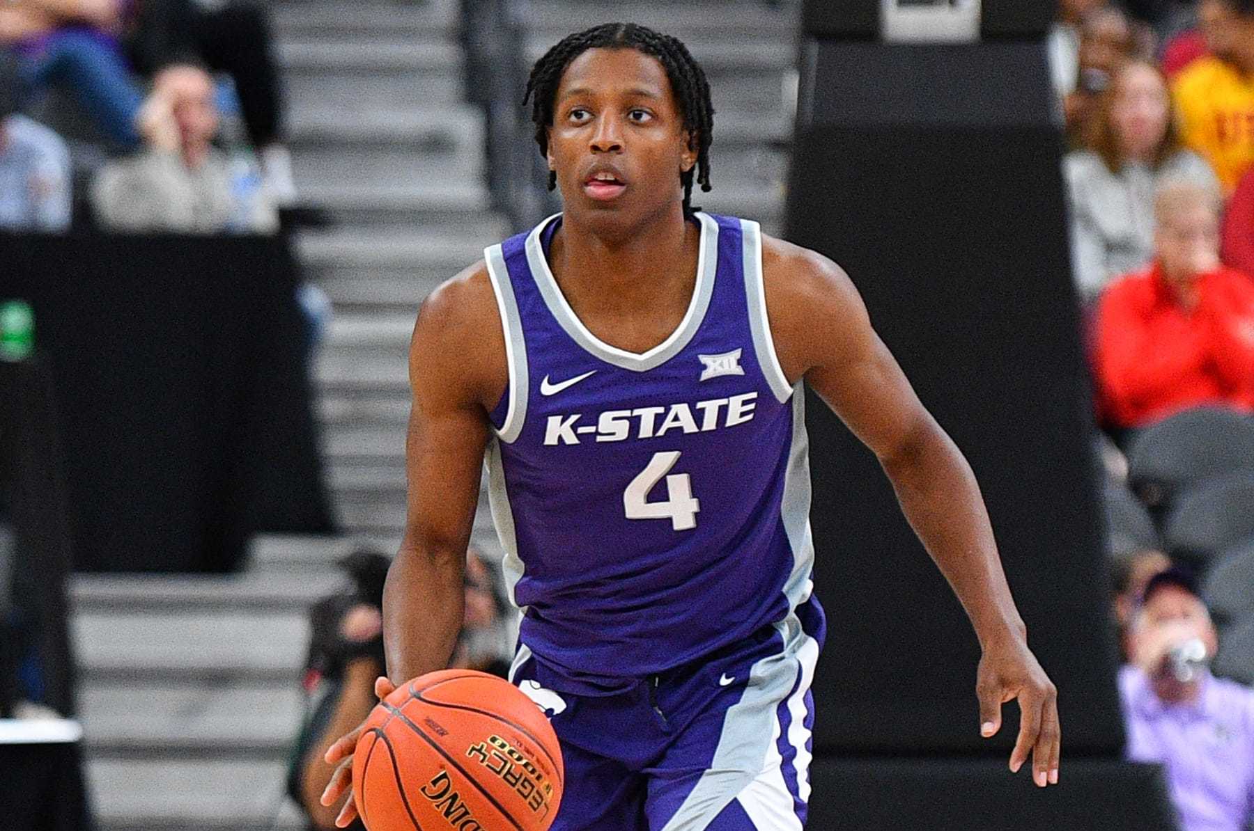 LAS VEGAS, NV - NOVEMBER 06: Kansas State Wildcats guard Dai Dai Ames (4) dribbles up the court during the Hall of Fame Series, a college basketball game between the Kansas State Wildcats and the USC Trojans on November 6, 2023 at T-Mobile Arena in Las Vegas, NV. (Photo by Brian Rothmuller/Icon Sportswire via Getty Images)
