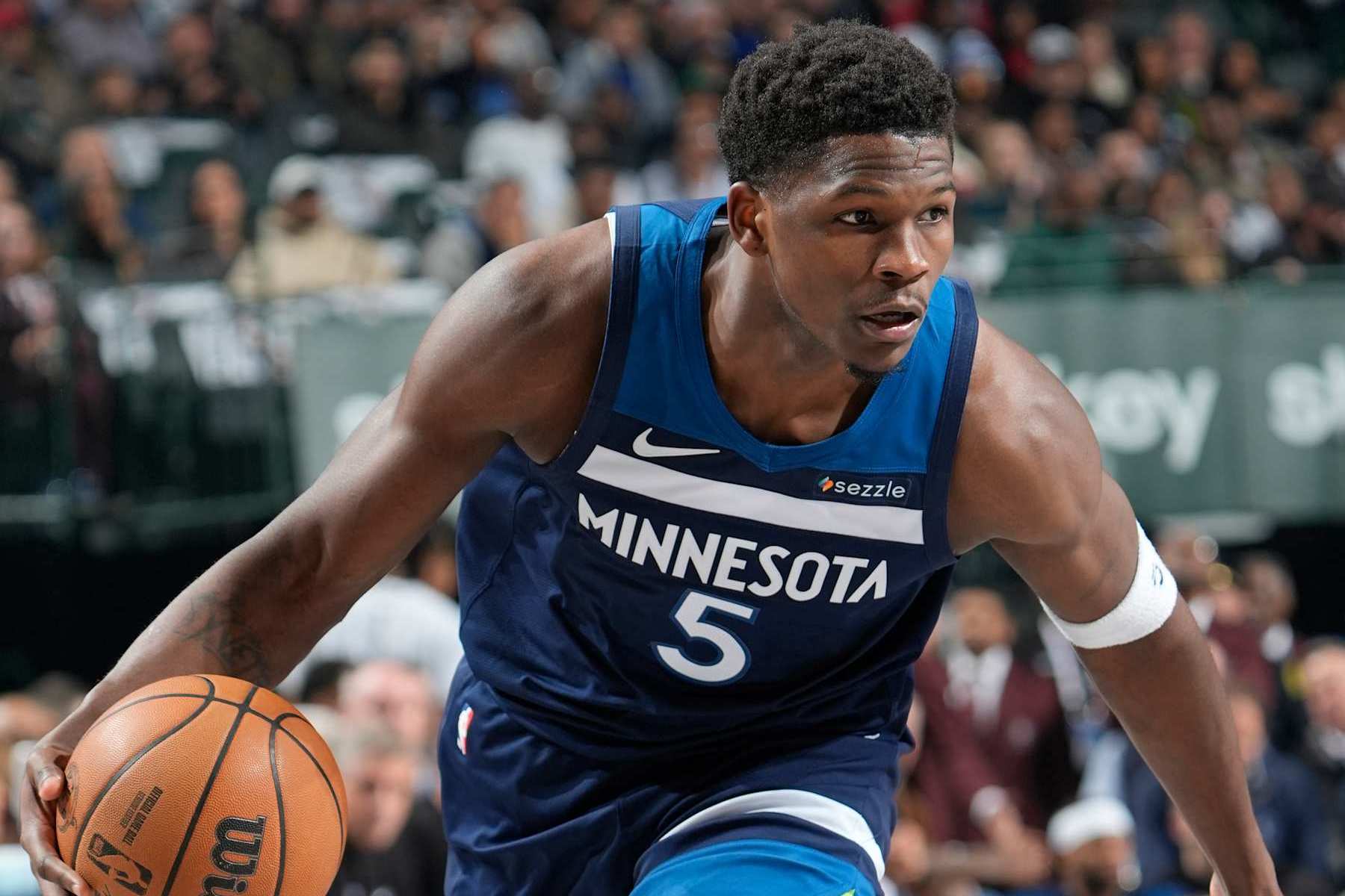 DALLAS, TX - JANUARY 22: Anthony Edwards #5 of the Minnesota Timberwolves handles the ball during the game against the Dallas Mavericks on January 22, 2025 at American Airlines Center in Dallas, Texas. NOTE TO USER: User expressly acknowledges and agrees that, by downloading and or using this photograph, User is consenting to the terms and conditions of the Getty Images License Agreement. Mandatory Copyright Notice: Copyright 2025 NBAE (Photo by Glenn James/NBAE via Getty Images)