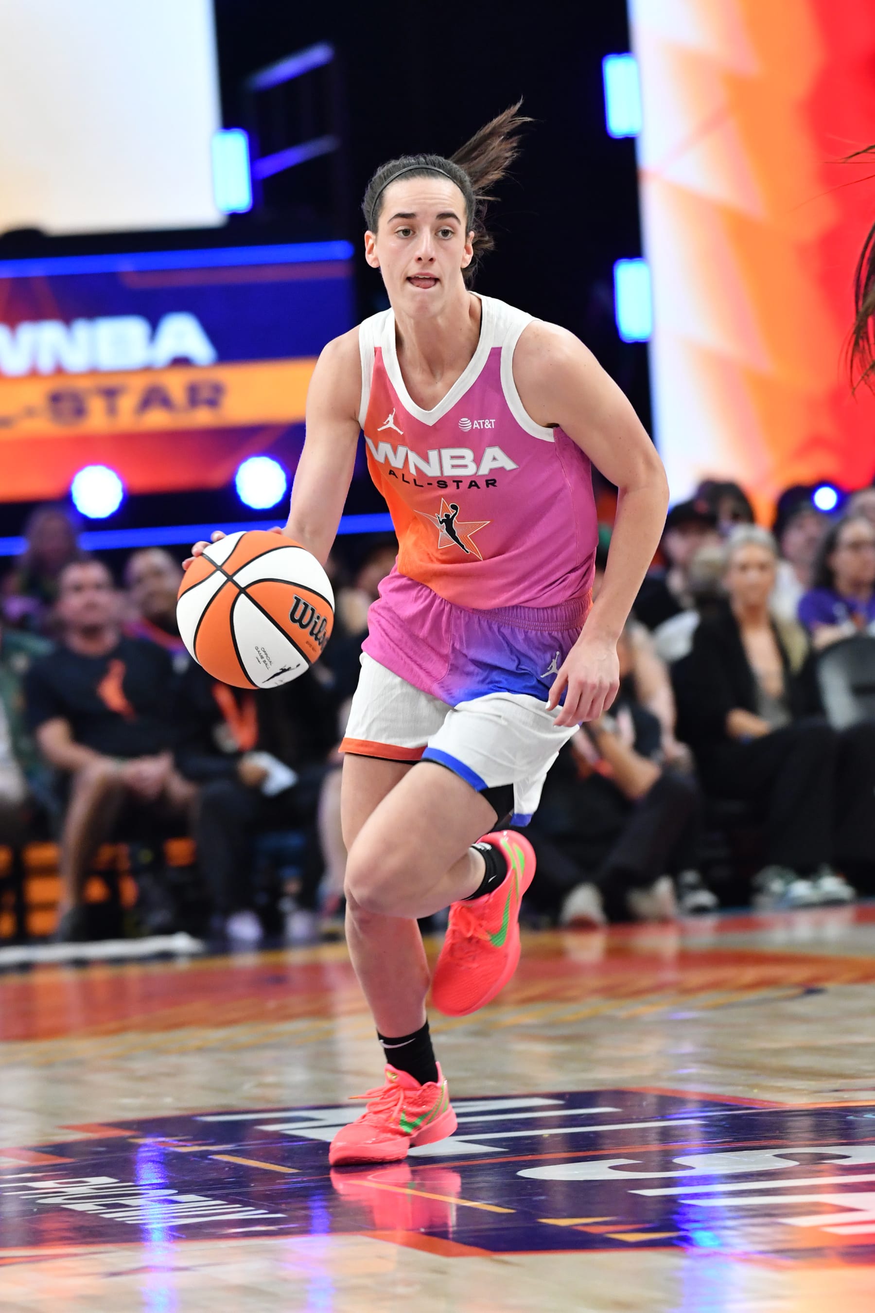 PHOENIX, AZ - JULY 20: Caitlin Clark #22 of Team WNBA dribbles the ball during the 2024 WNBA All Star Game on July 20, 2024 at Footprint Center in Phoenix, Arizona. NOTE TO USER: User expressly acknowledges and agrees that, by downloading and or using this photograph, user is consenting to the terms and conditions of the Getty Images License Agreement. Mandatory Copyright Notice: Copyright 2024 NBAE (Photo by Juan Ocampo/NBAE via Getty Images)