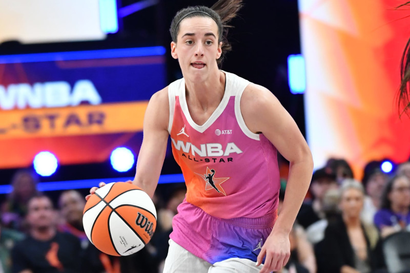 PHOENIX, AZ - JULY 20: Caitlin Clark #22 of Team WNBA dribbles the ball during the 2024 WNBA All Star Game on July 20, 2024 at Footprint Center in Phoenix, Arizona. NOTE TO USER: User expressly acknowledges and agrees that, by downloading and or using this photograph, user is consenting to the terms and conditions of the Getty Images License Agreement. Mandatory Copyright Notice: Copyright 2024 NBAE (Photo by Juan Ocampo/NBAE via Getty Images)
