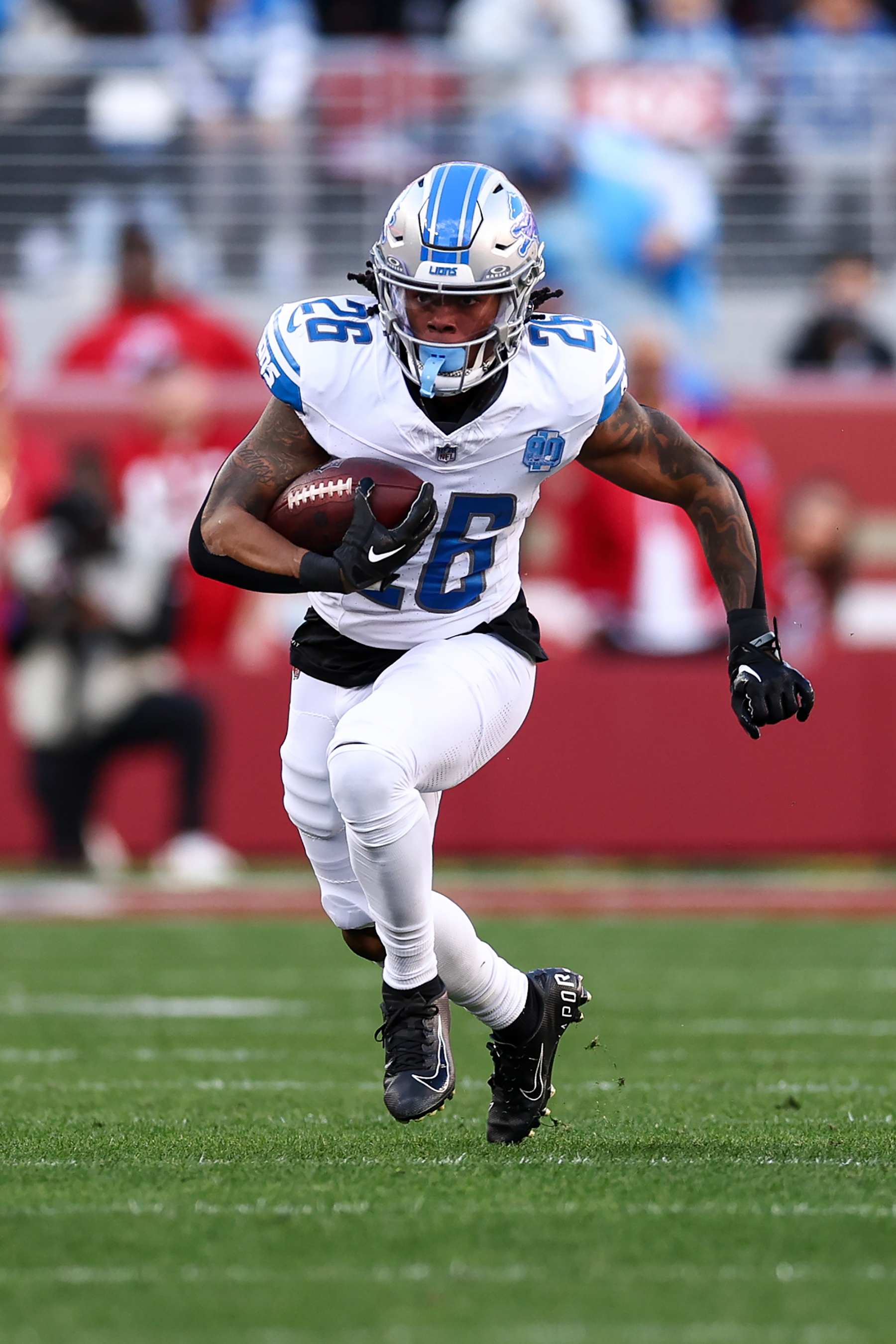 SANTA CLARA, CA - JANUARY 28: Jahmyr Gibbs #26 of the Detroit Lions carries the ball during the NFC Championship NFL football game against the San Francisco 49ers at Levi's Stadium on January 28, 2024 in Santa Clara, California. (Photo by Kevin Sabitus/Getty Images) SANTA CLARA, CA - JANUARY 28: Jahmyr Gibbs #26 of the Detroit Lions carries the ball during the NFC Championship NFL football game against the San Francisco 49ers at Levi's Stadium on January 28, 2024 in Santa Clara, California. (Photo by Kevin Sabitus/Getty Images)