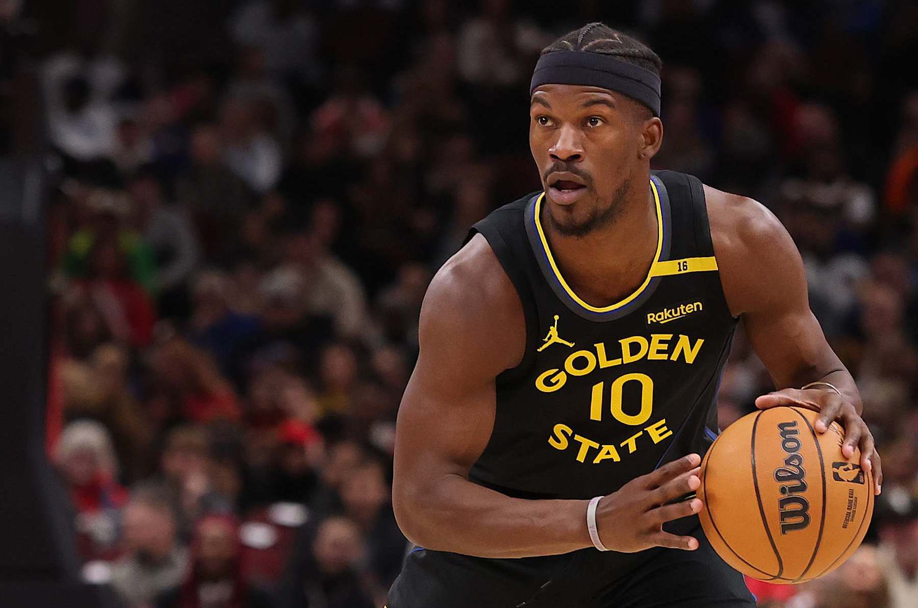 CHICAGO, ILLINOIS - FEBRUARY 08: Jimmy Butler #10 of the Golden State Warriors dribbles against the Chicago Bulls during the first half at the United Center on February 08, 2025 in Chicago, Illinois. NOTE TO USER: User expressly acknowledges and agrees that, by downloading and or using this photograph, User is consenting to the terms and conditions of the Getty Images License Agreement.  (Photo by Michael Reaves/Getty Images)