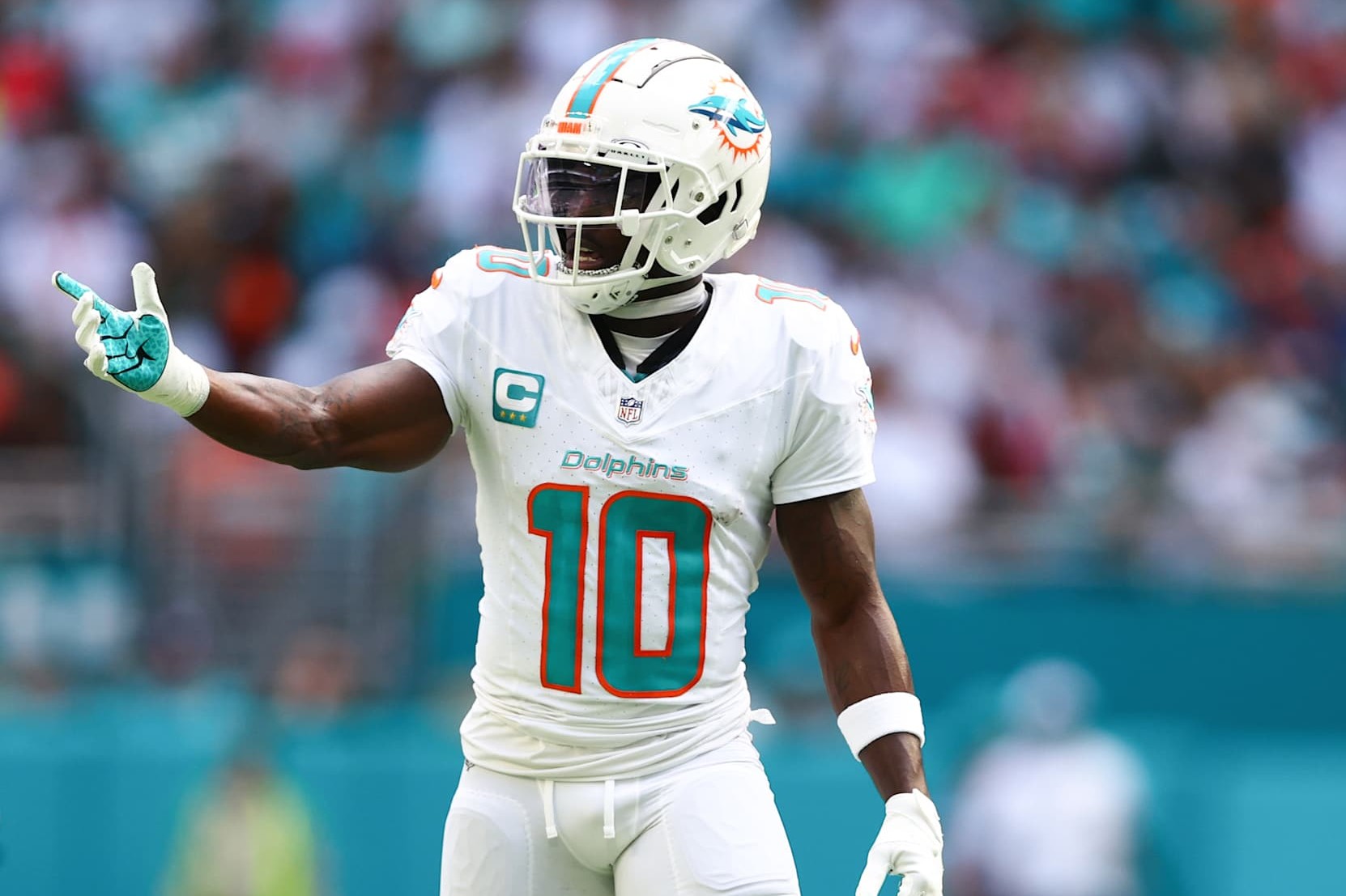 MIAMI GARDENS, FLORIDA - NOVEMBER 24: Tyreek Hill #10 of the Miami Dolphins reacts during the first half of the game against the New England Patriots at Hard Rock Stadium on November 24, 2024 in Miami Gardens, Florida. (Photo by Megan Briggs/Getty Images)