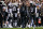 BOULDER, CO - NOVEMBER 4:  Head coach Deion Sanders of the Colorado Buffaloes has a word with quarterback Shedeur Sanders #2 before his first offensive drive in the first half of a game against the Oregon State Beavers at Folsom Field on November 4, 2023 in Boulder, Colorado. (Photo by Dustin Bradford/Getty Images)