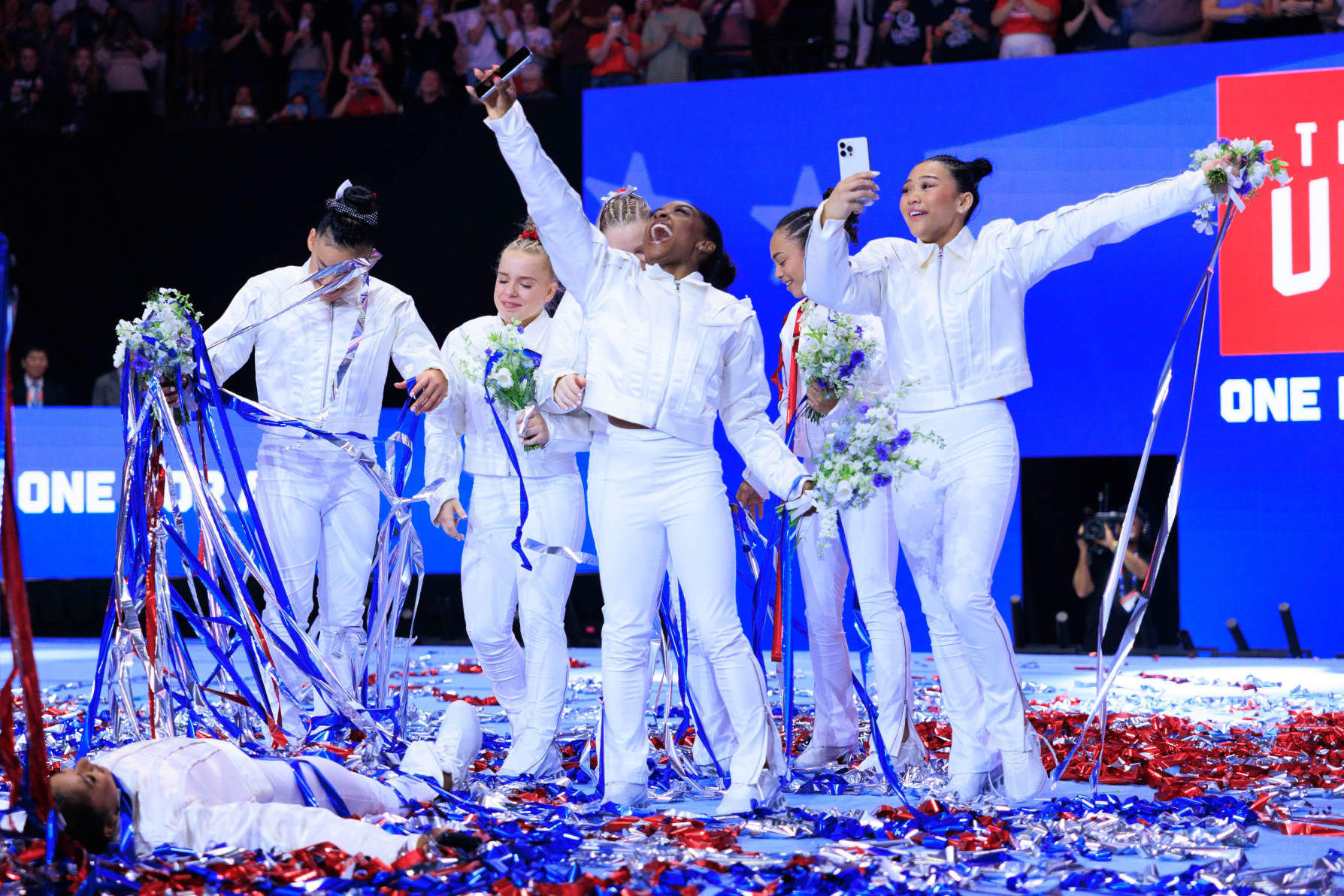 MINNEAPOLIS, UNITED STATES - JUNE 30: Jordan Chiles, Leanne Wong (alternate), Joscelyn Roberson (alternate), Jade Carey, Simone Biles, Hezly Rivera, and Suni Lee stand after being named at the U.S. Olympic Team for women's gymnastics at Target Center in Minneapolis, United States on June 30, 2024. (Photo by Nikolas Liepins/Anadolu via Getty Images)