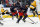 COLUMBUS, OH - SEPTEMBER 25: Columbus Blue Jackets left wing Johnny Gaudreau (13) with the puck challenged by Pittsburgh Penguins left wing Danton Heinen (43) during the preseason game between the Columbus Blue Jackets and the Pittsburgh Penguins on September 24, 2022, at Nationwide Arena in Columbus, Ohio. (Photo by Graham Stokes/Icon Sportswire via Getty Images)