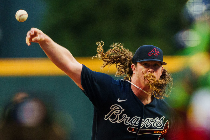 ATLANTA, GA - OCTOBER 4: Grant Holmes #45 of the Atlanta Braves pitches during the Atlanta Braves Postseason workout at Truist Park on October 4, 2023 in Atlanta, Georgia. (Photo by Matthew Grimes Jr./Atlanta Braves/Getty Images)