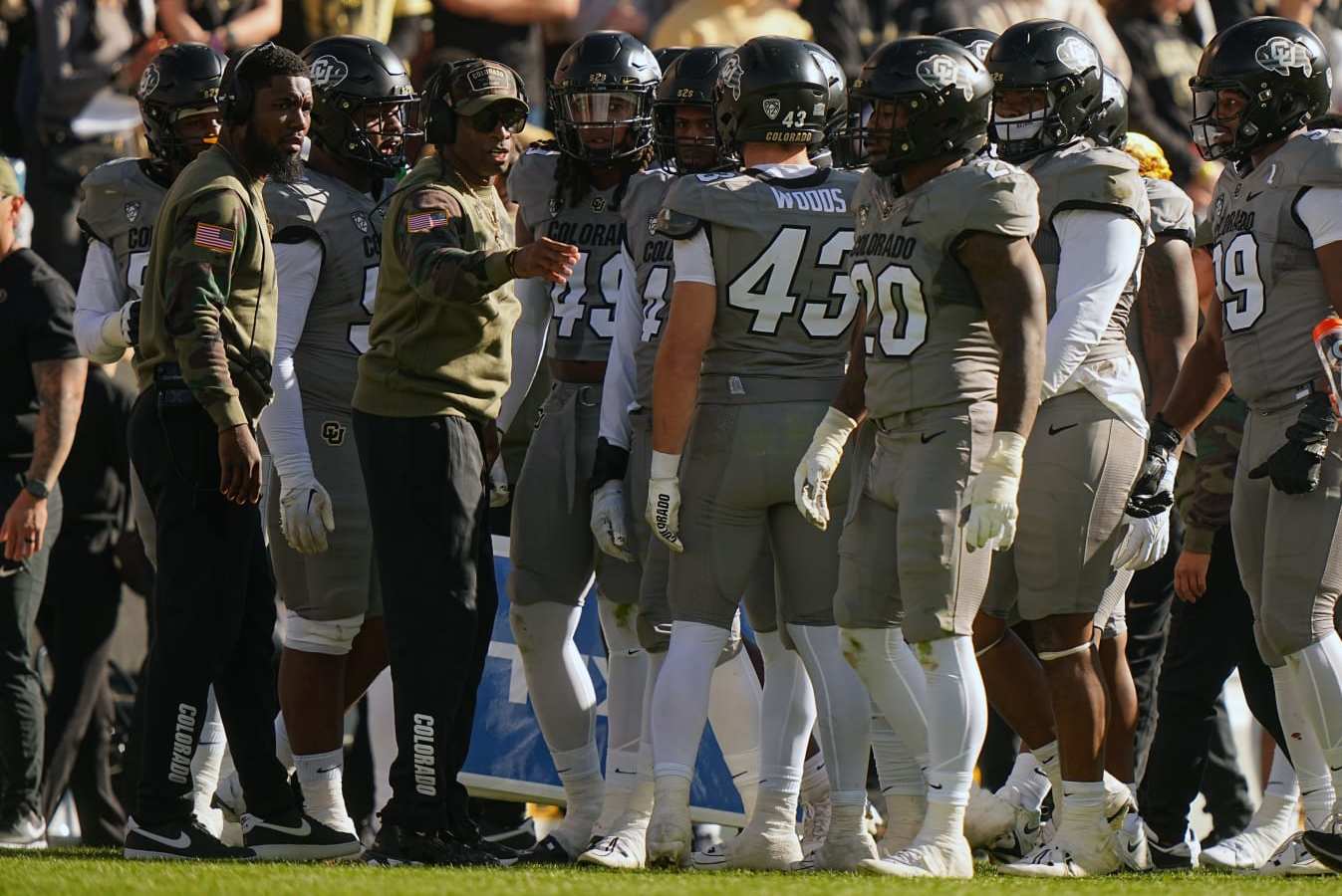 College Football: Colorado head coach Deion Sanders and assistant coach Nick Williams talks to the team vs Arizona at Folsom Field. 
Boulder, CO 11/11/2023 
CREDIT: Erick W. Rasco (Photo by Erick W. Rasco/Sports Illustrated via Getty Images) 
(Set Number: X164462)