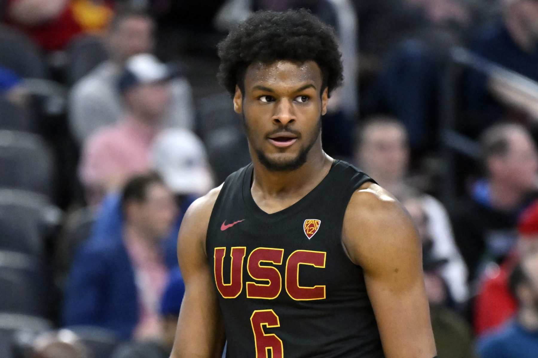 LAS VEGAS, NEVADA - MARCH 14: Bronny James #6 of the USC Trojans looks on in the second half of a quarterfinal game against the Arizona Wildcats during the Pac-12 Conference basketball tournament at T-Mobile Arena on March 14, 2024 in Las Vegas, Nevada. The Wildcats defeated the Trojans 70-49. (Photo by David Becker/Getty Images)