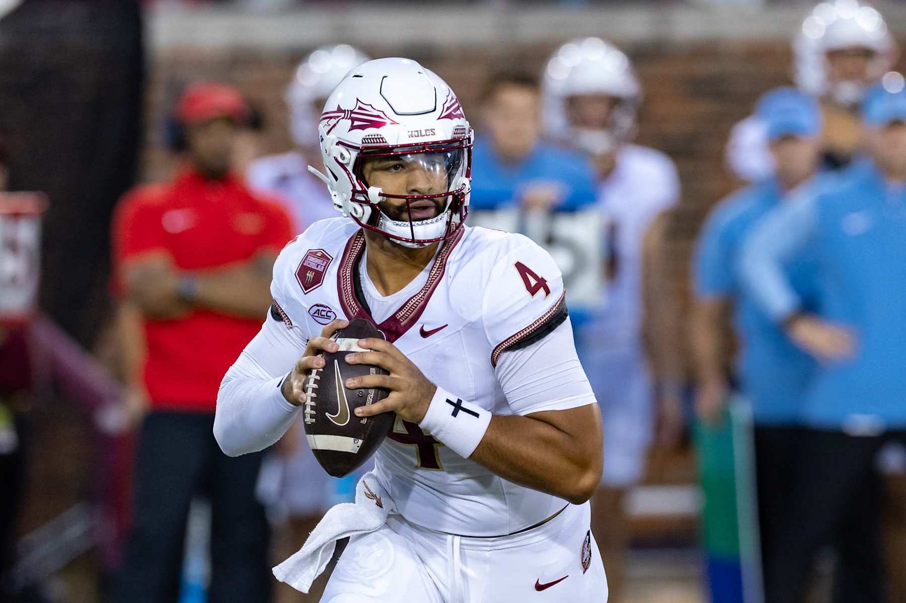 DALLAS, TX - SEPTEMBER 28: Florida State Seminoles quarterback DJ Uiagalelei (#4) runs up field during the college football game between the SMU Mustangs and the Florida State Seminoles on September 28, 2024, at Gerald J. Ford Stadium in Dallas, TX.  (Photo by Matthew Visinsky/Icon Sportswire via Getty Images)