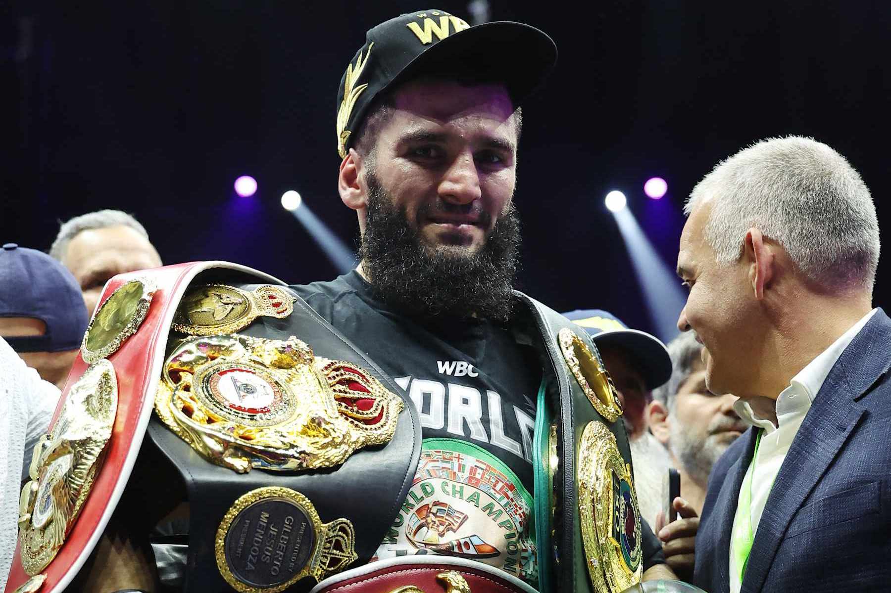 RIYADH, SAUDI ARABIA - OCTOBER 12: Artur Beterbiev celebrates victory with the Undisputed Light Heavyweight title belt during the IBF, IBO, WBC and WBO World Light Heavyweight titles' fight between Artur Beterbiev and Dmitrii Bivol as part of the Riyadh Season - IV Crown Showdown card at Kingdom Arena on October 12, 2024 in Riyadh. (Photo by Richard Pelham/Getty Images)